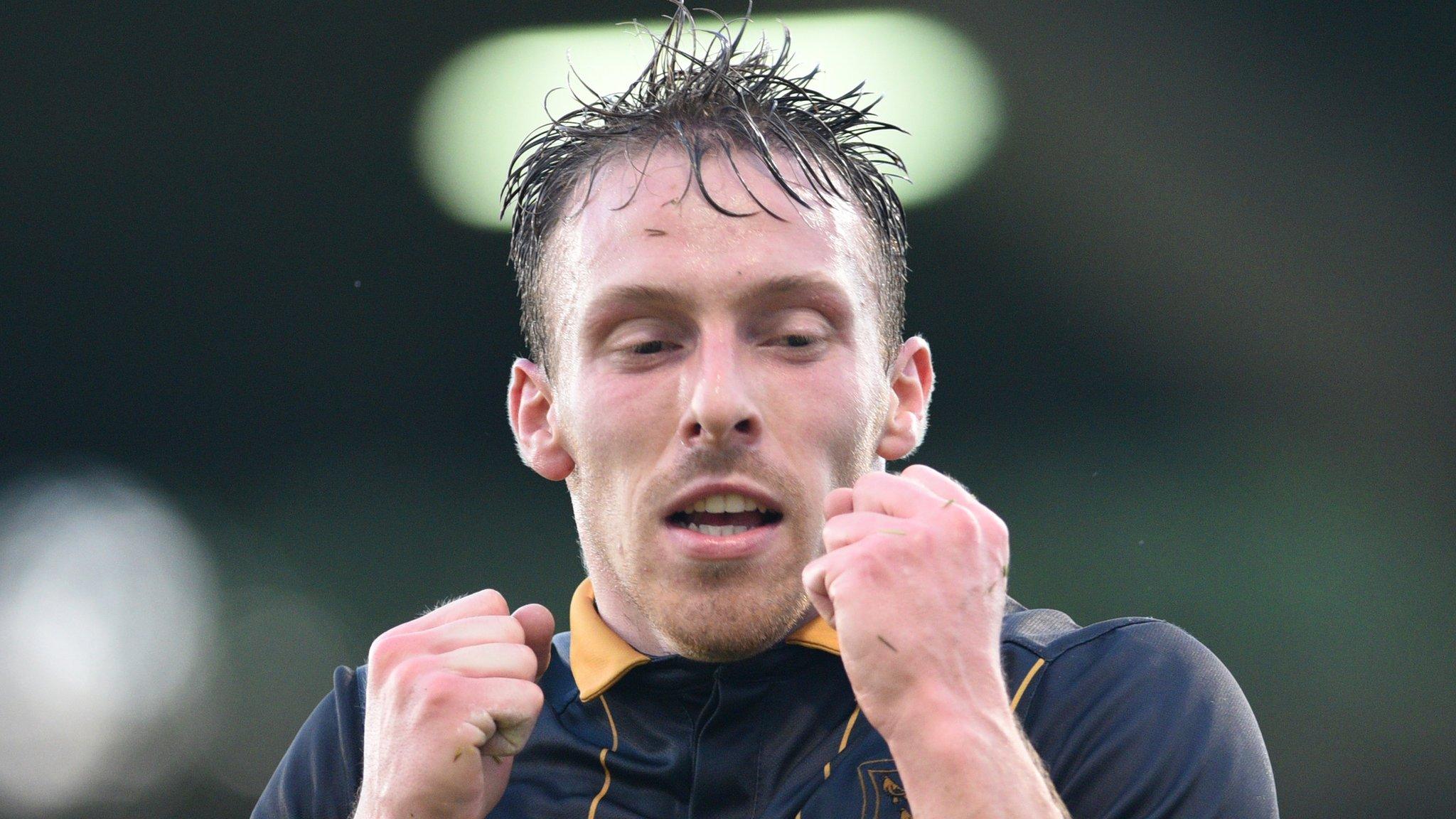 David McMillan celebrates after scoring his first goal in Tuesday's win