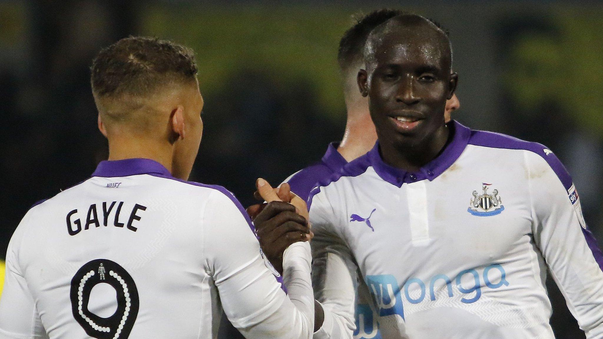 Dwight Gayle and Mo Diame celebrate