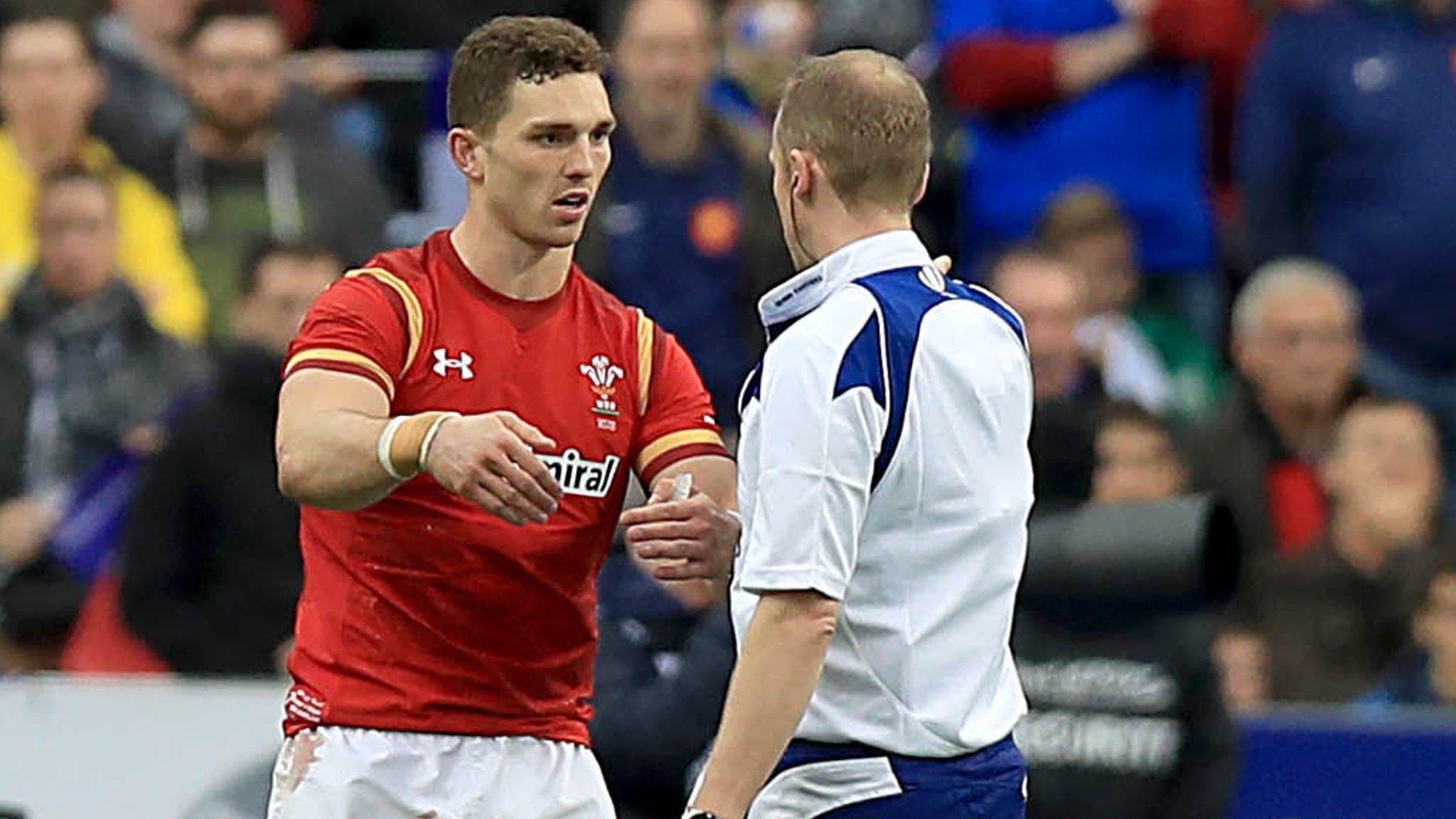 George North with Wayne Barnes