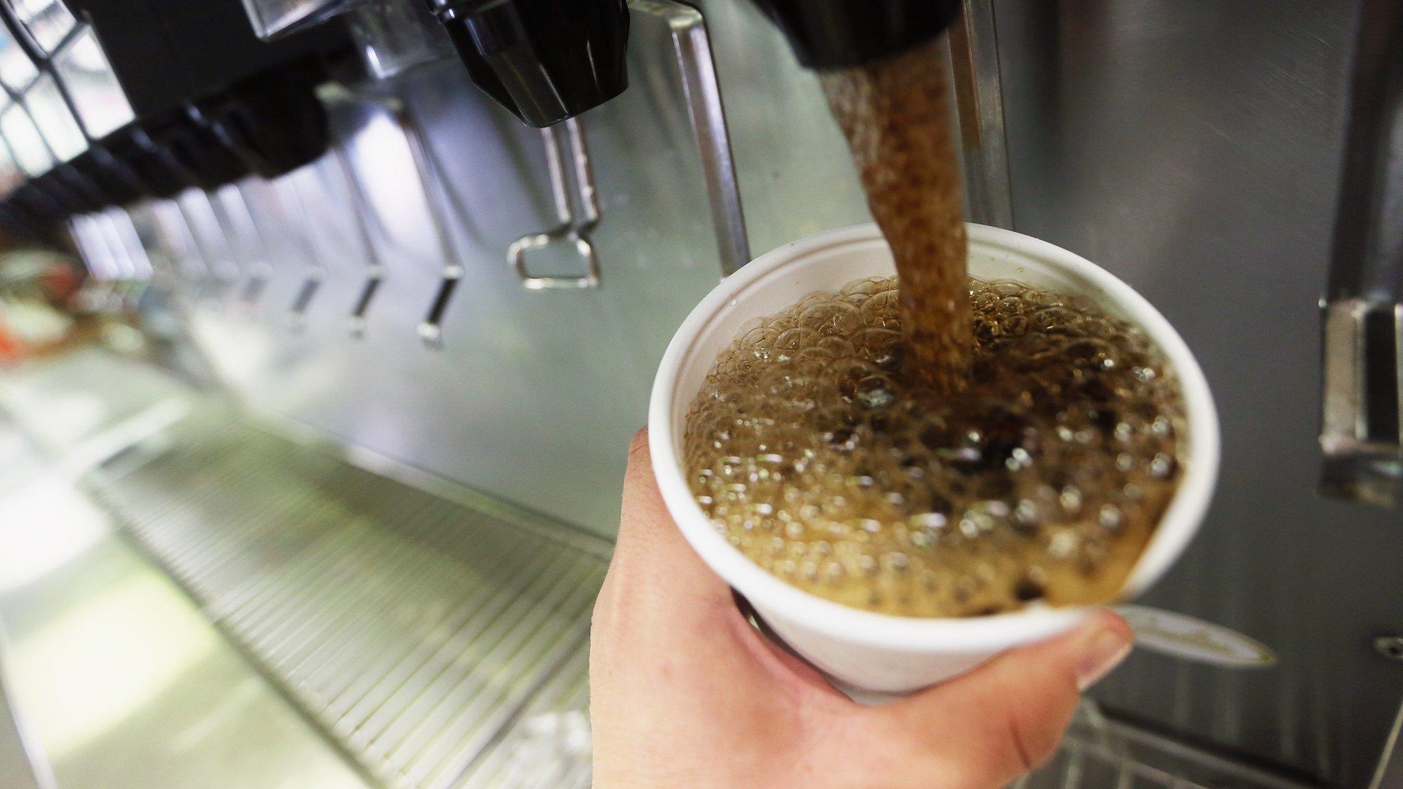 Pouring fizzy drink