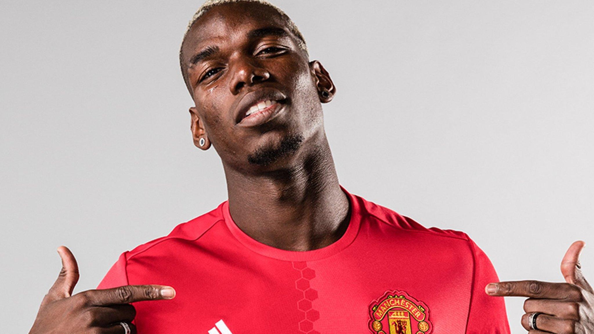 Paul Pogba signs for Manchester United