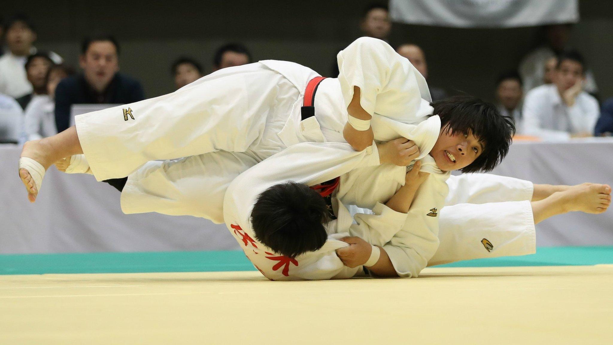 YOKOHAMA, JAPAN - APRIL 21: Akira Sone (top) compete against Chie Sasaki in the third round match during the All Japan Women's Judo Championship at Yokohama Cultural Gymnasium on April 21, 2019 in Yokohama, Kanagawa, Japan. (Photo by Takashi Aoyama/Getty Images)