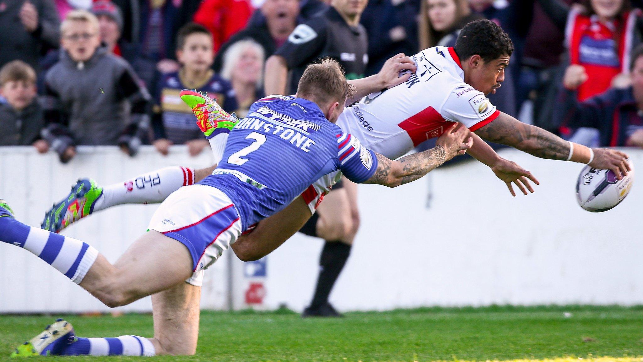 Hull KR's Kieran Dixon scores a try