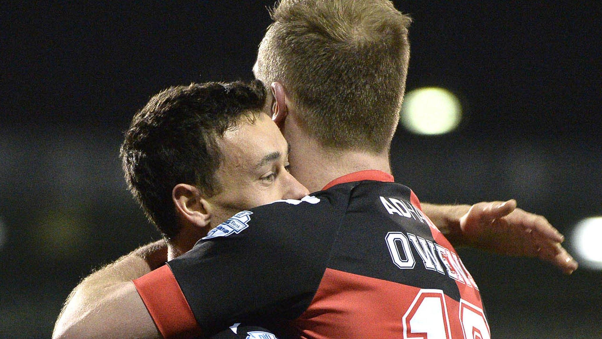 Paul Heatley celebrates his goal against Linfield with Jordan Owens