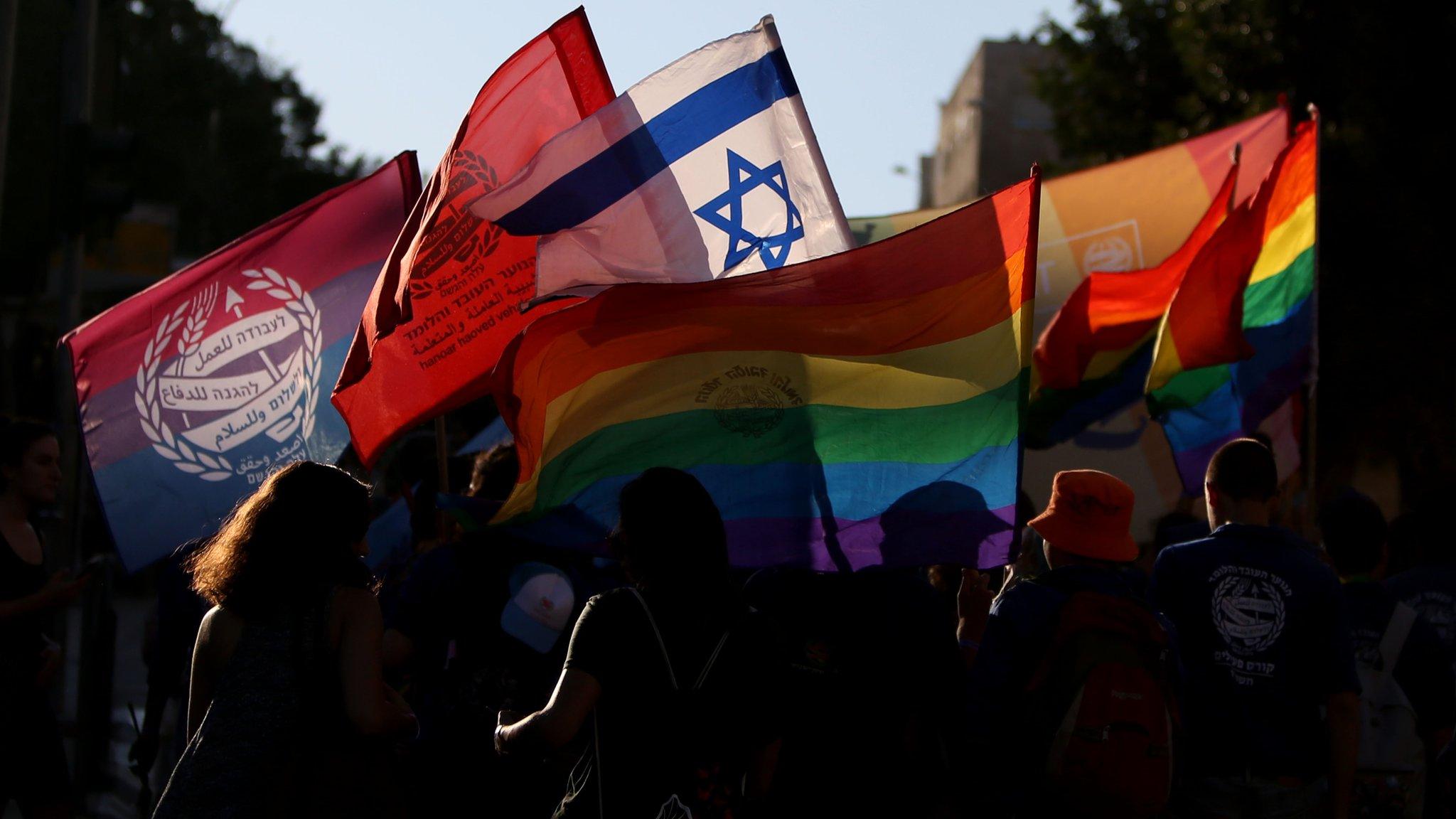 Participants attend the annual Jerusalem Gay Pride Parade on 3 August 2017