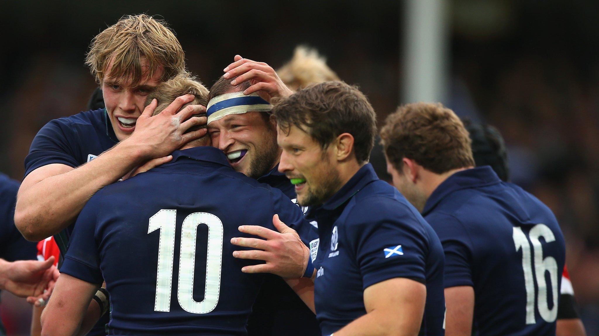 Scotland players celebrate against Japan