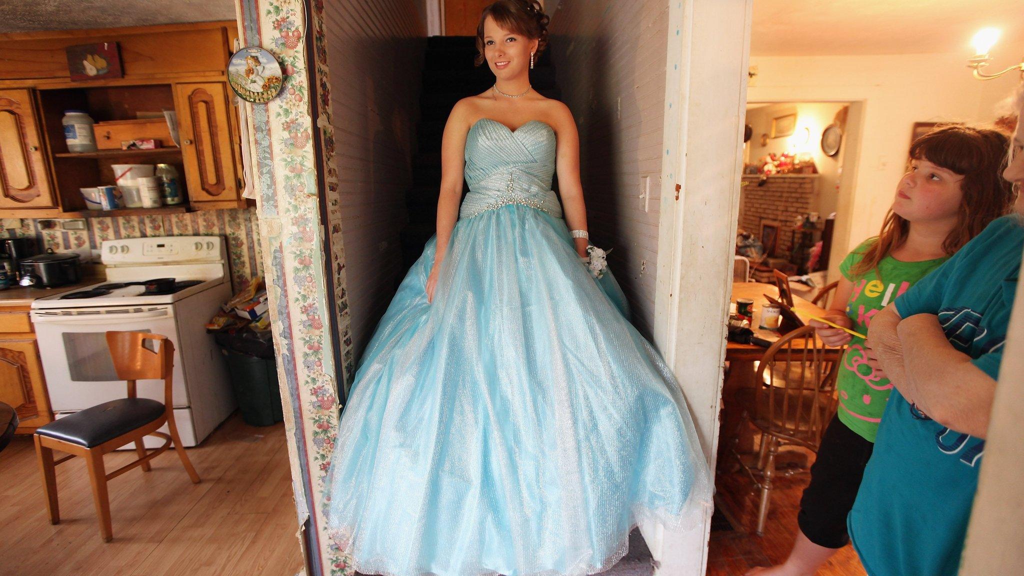 Brittany Brewer poses while preparing for the Owsley County High School prom in the home where she lives with her grandmother on April 21, 2012 in Booneville, Kentucky