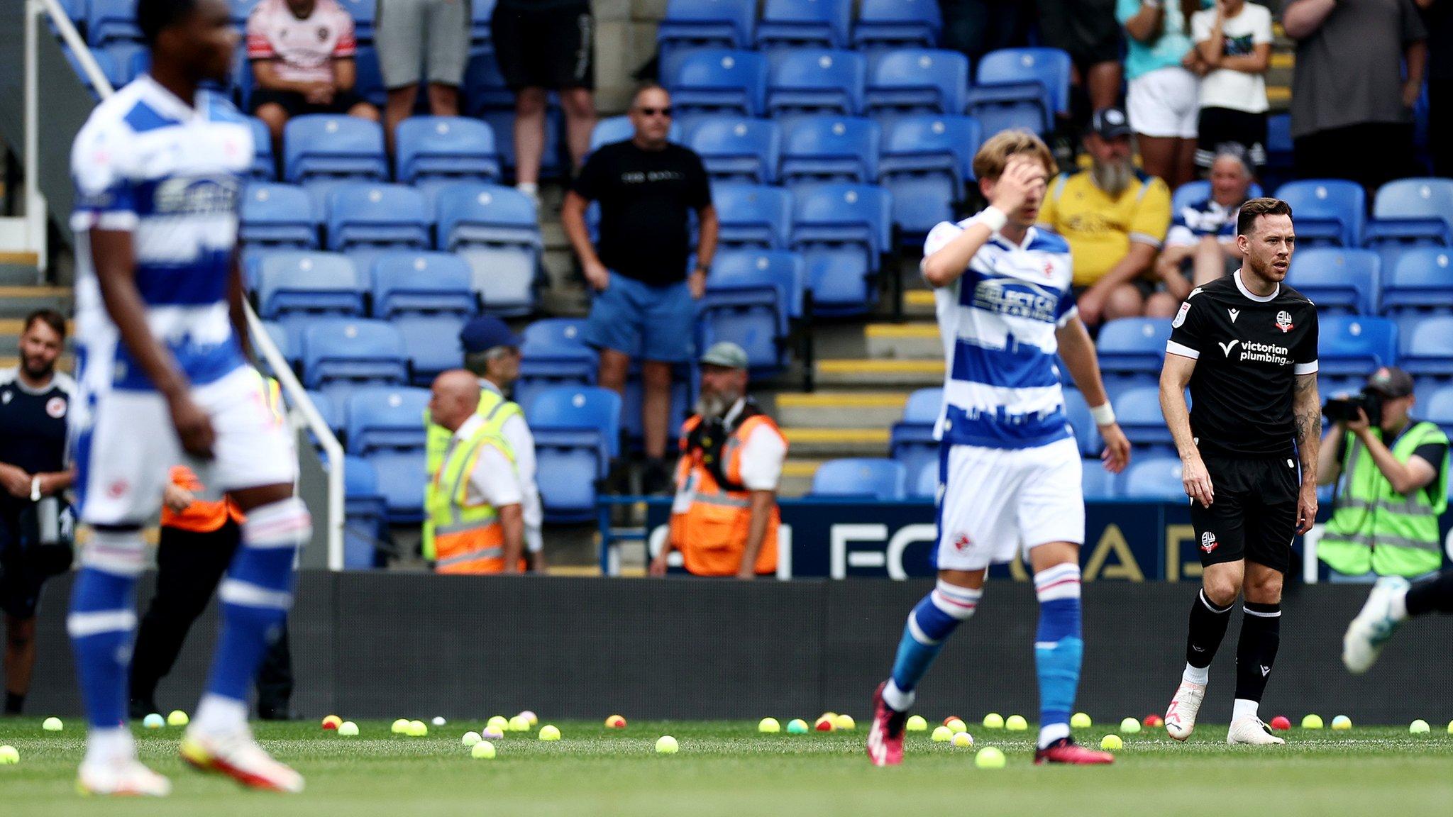 Tennis balls on the pitch at Reading