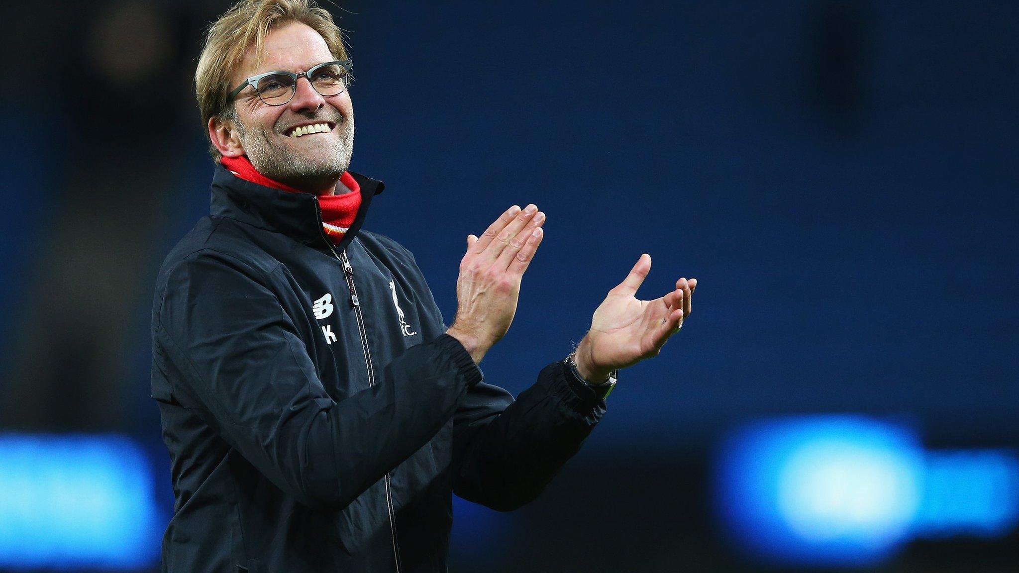 Jurgen Klopp applauds the Liverpool fans