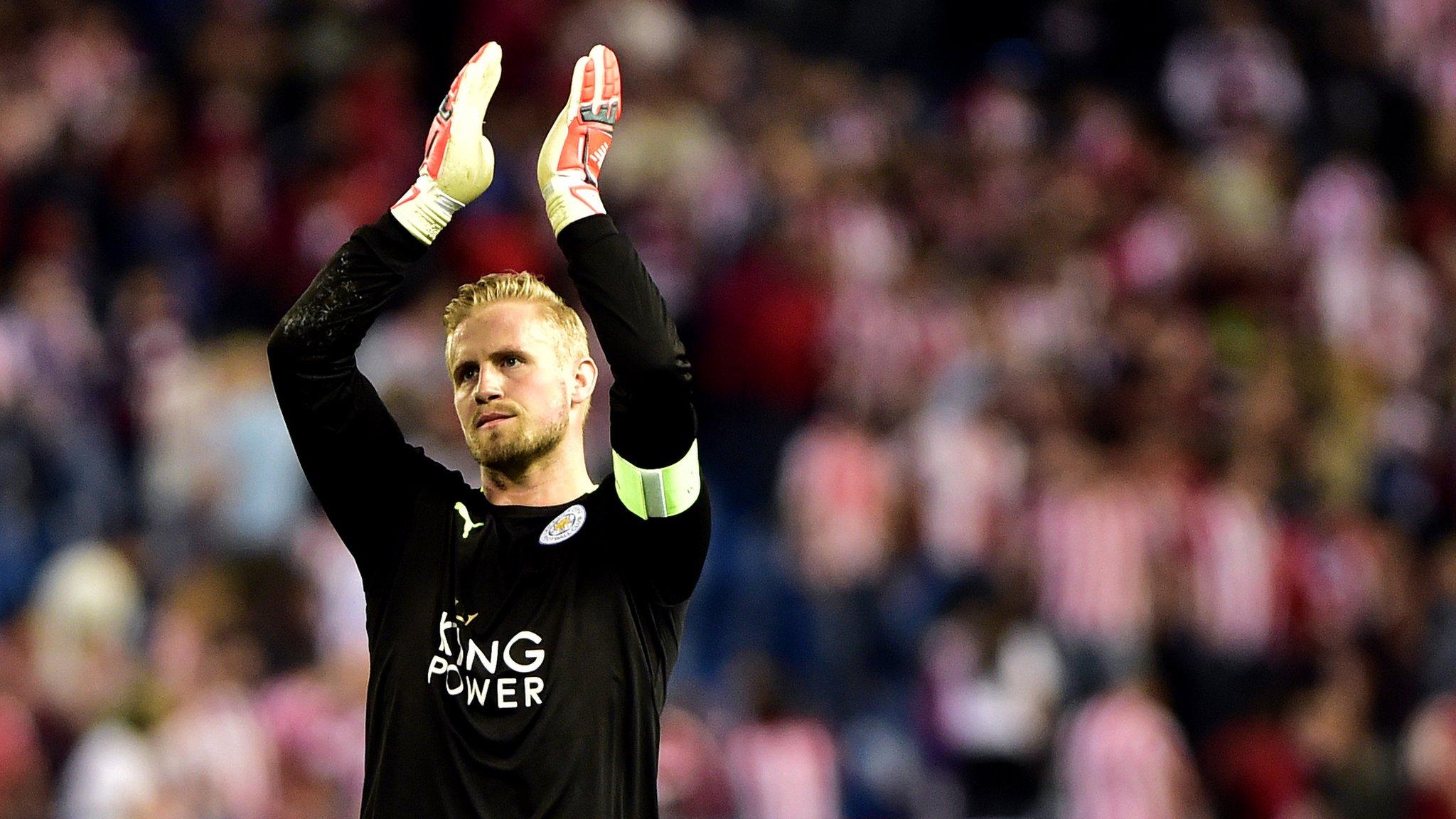 Kasper Schmeichel applauds the fans