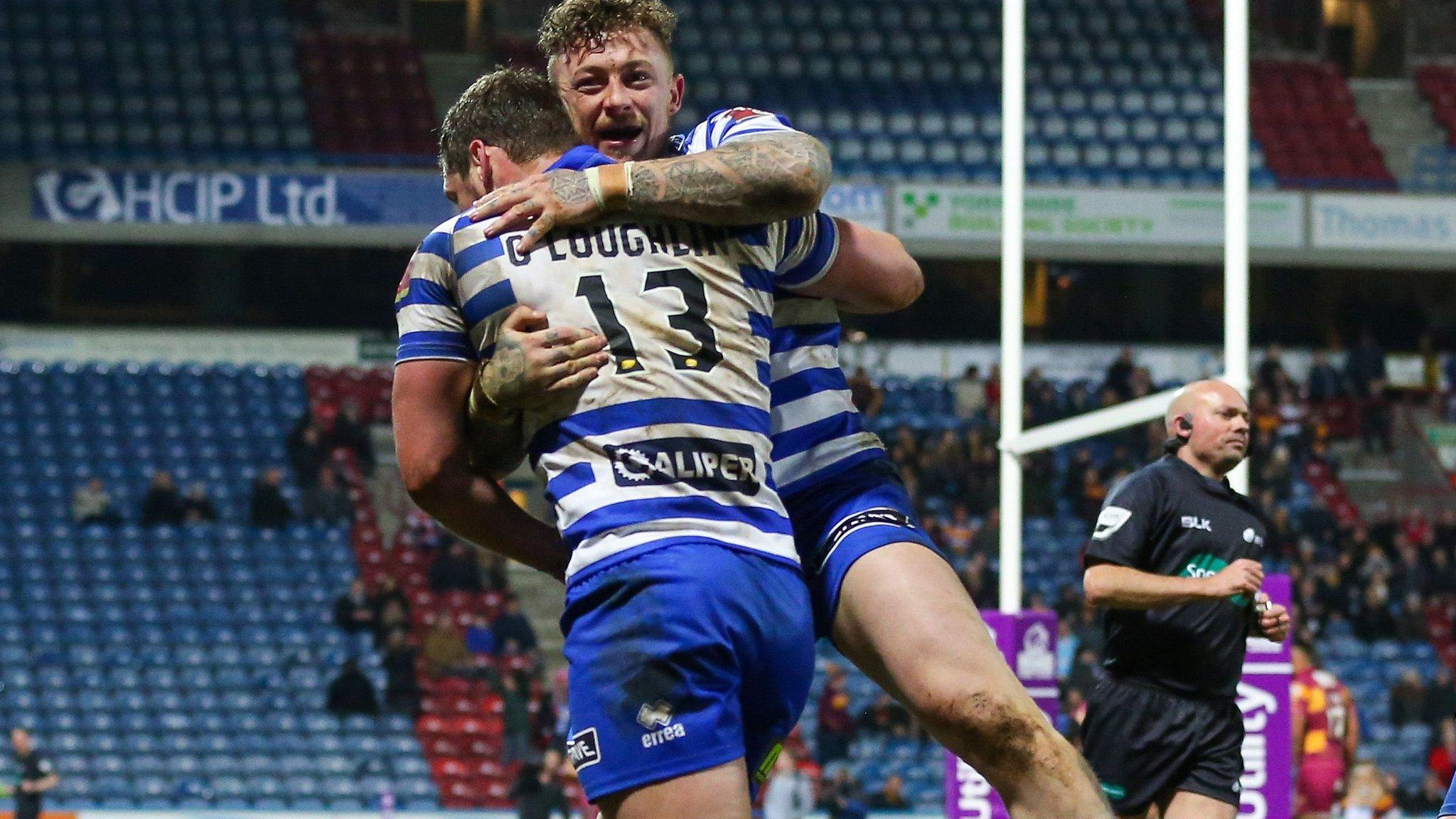 Josh Charnley celebrates with Sean O'Loughlin