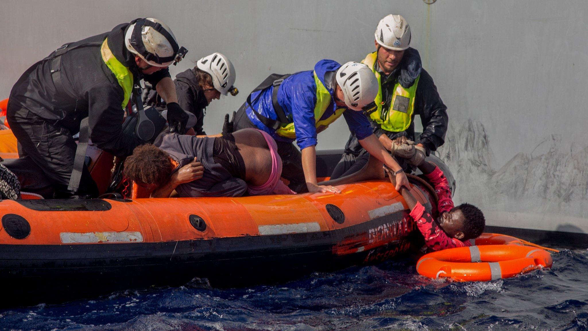 Migrants are rescued by members of German charity Sea-Watch in the Mediterranean Sea on November 6, 2017