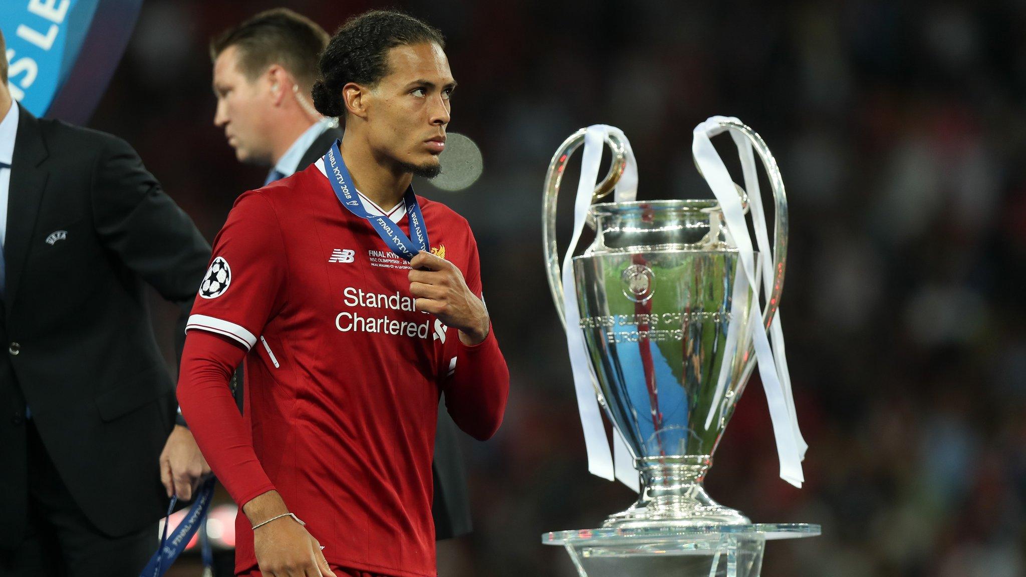 Virgil Van Djik with Champions League trophy