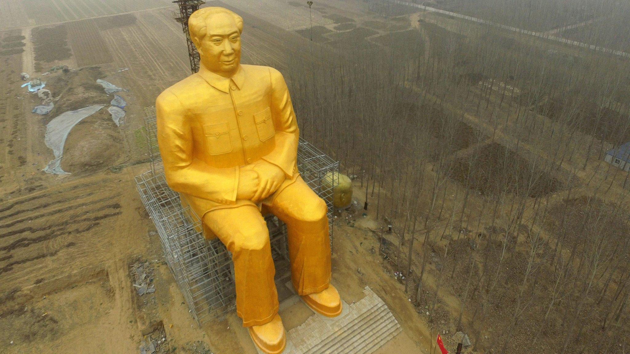 Giant Mao statue in farmland