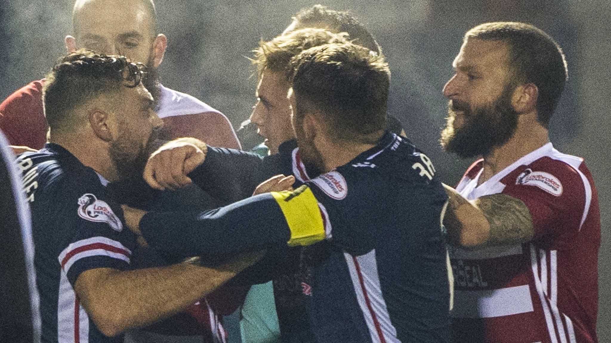 Hamilton and Ross County players have to be separated after a late touchline brawl