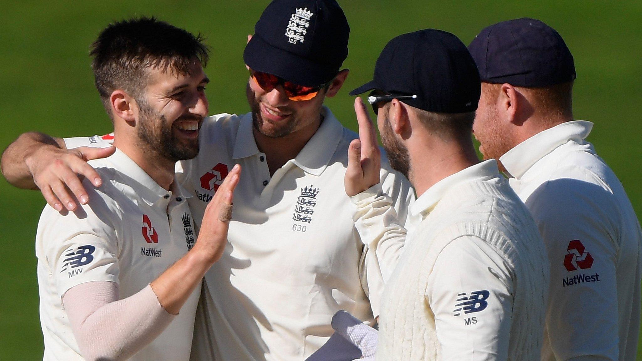 England celebrate with Mark Wood