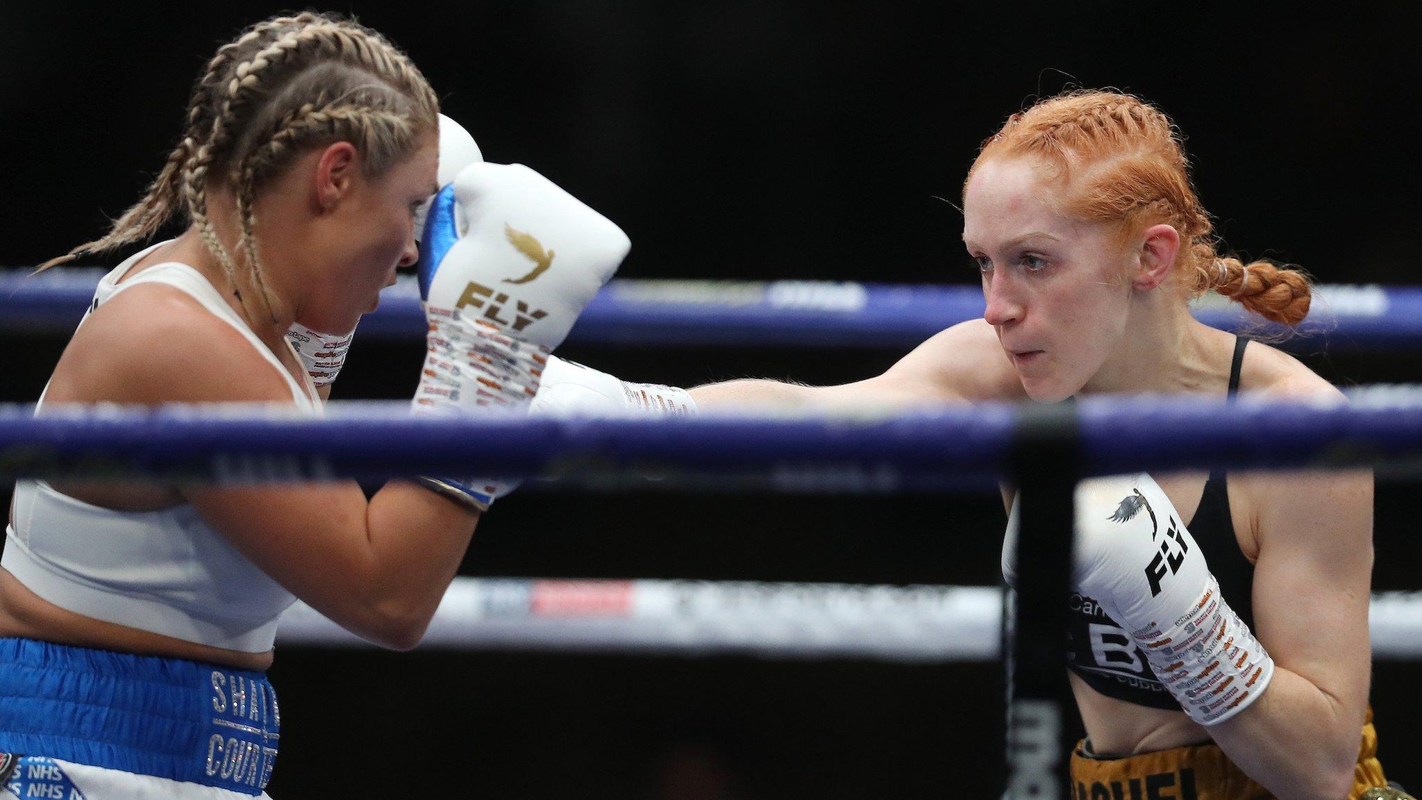 Shannon Courtenay (left) puts her hands up in defence as Rachel Ball (right) punches