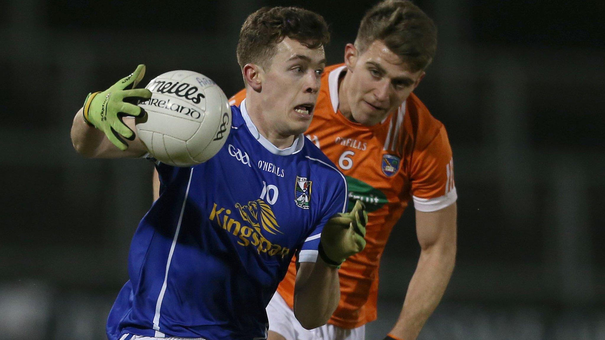 Cavan's Dara McVeety moves clear of Armagh opponent Shea Heffron