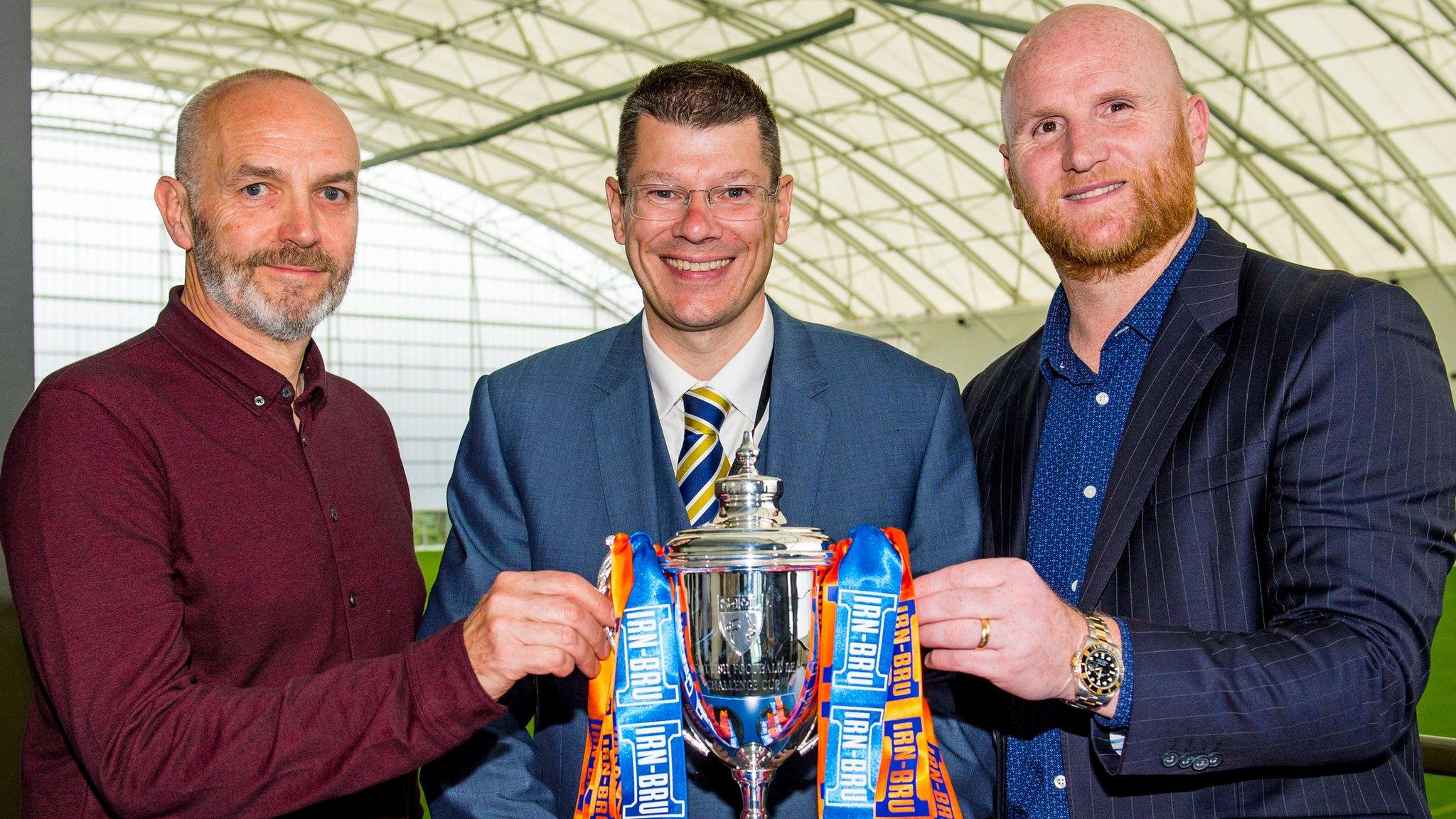 Neil Doncaster and others with the Challenge Cup trophy