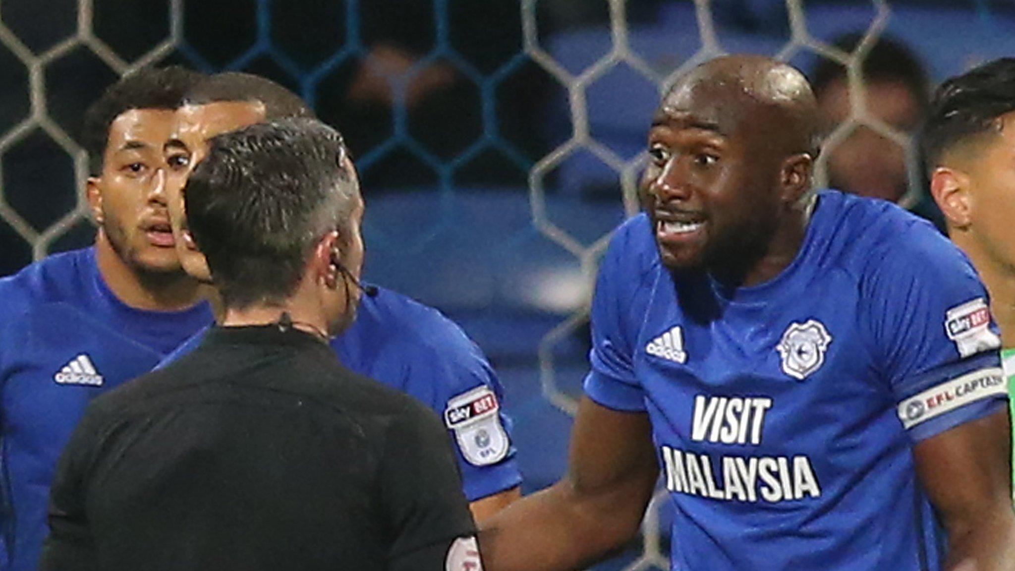 Sol Bamba shrugs as he argues with referee Darren Bond after giving away a penalty against Bolton Wanderers