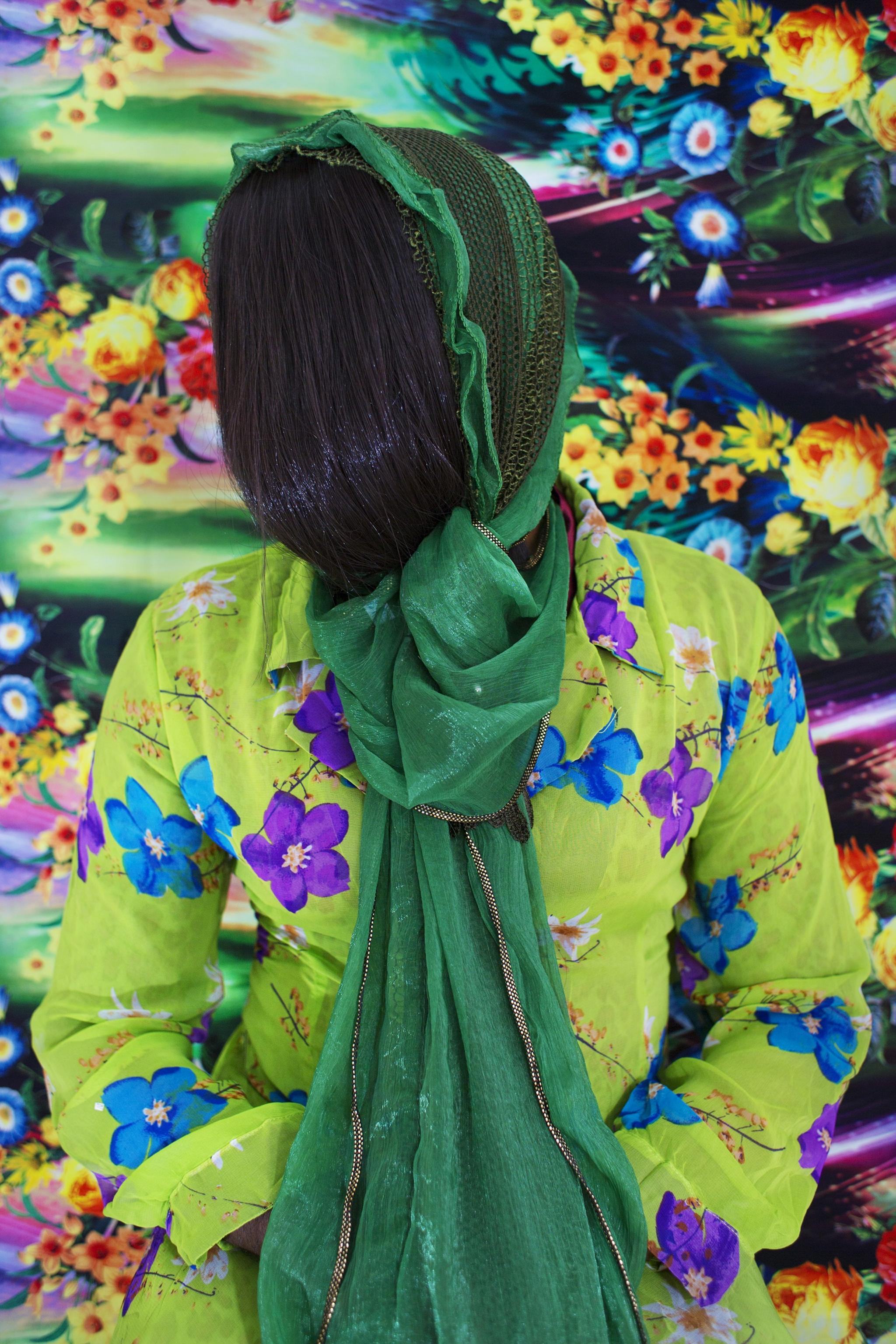 Bangladeshi woman with face covered by her hair