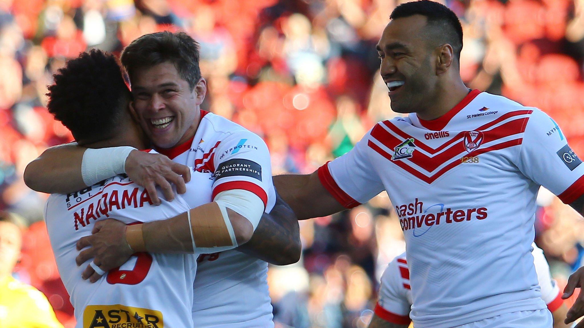 Louie McCarthy-Scarsbrook celebrates with Kevin Naiqama