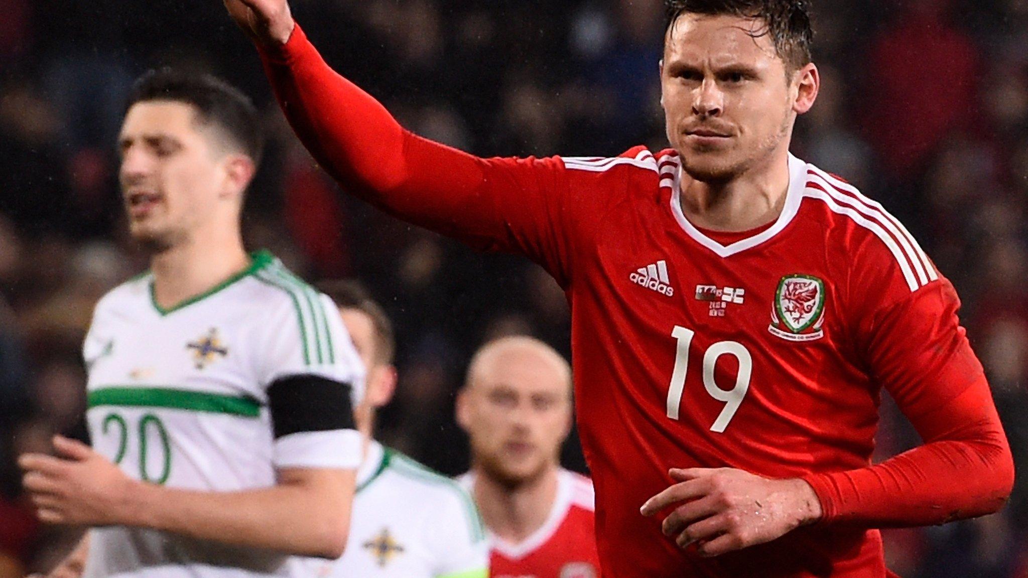 Simon Church celebrates scoring for Wales against Northern Ireland