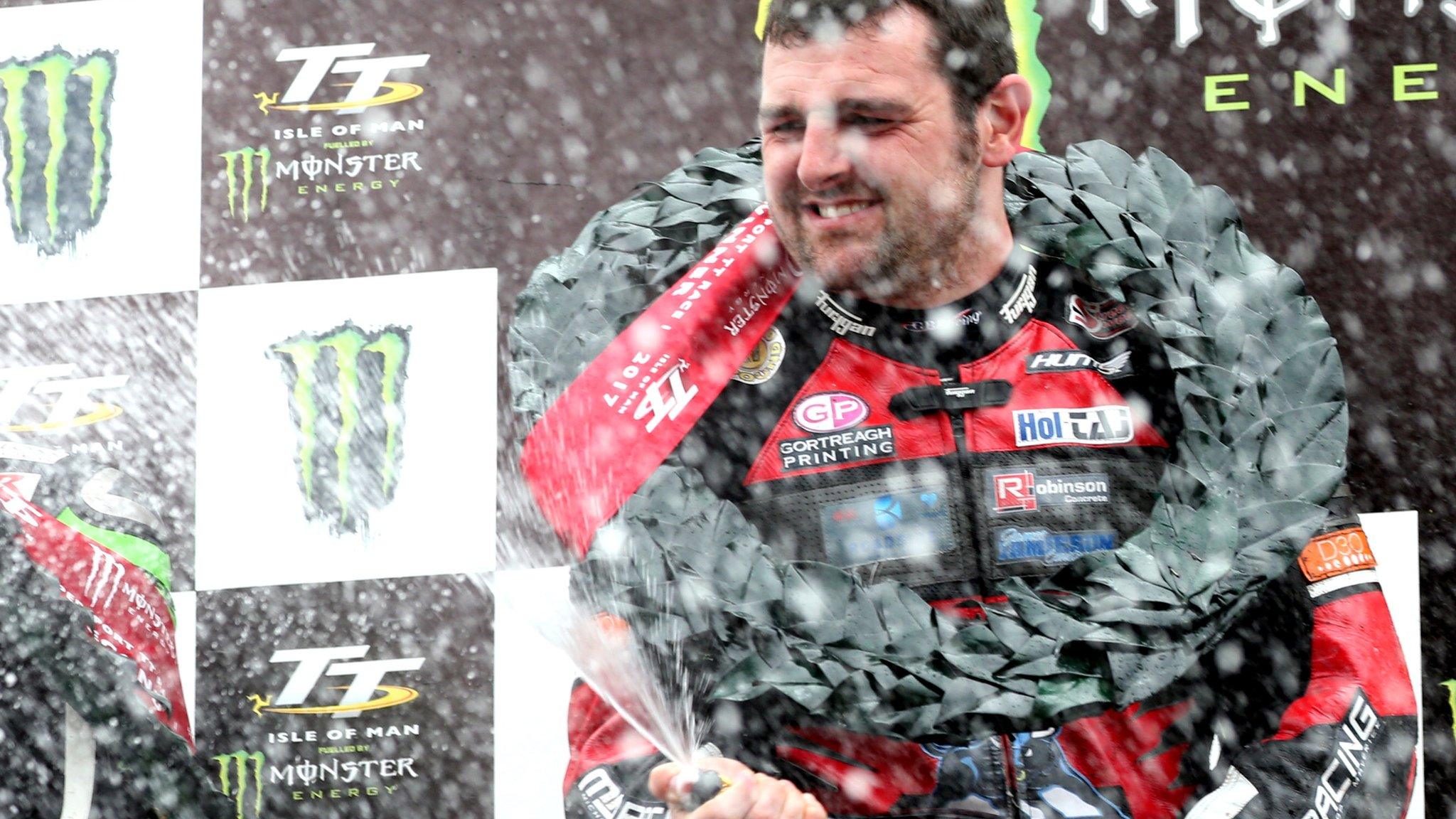 Michael Dunlop celebrates his Supersport victory