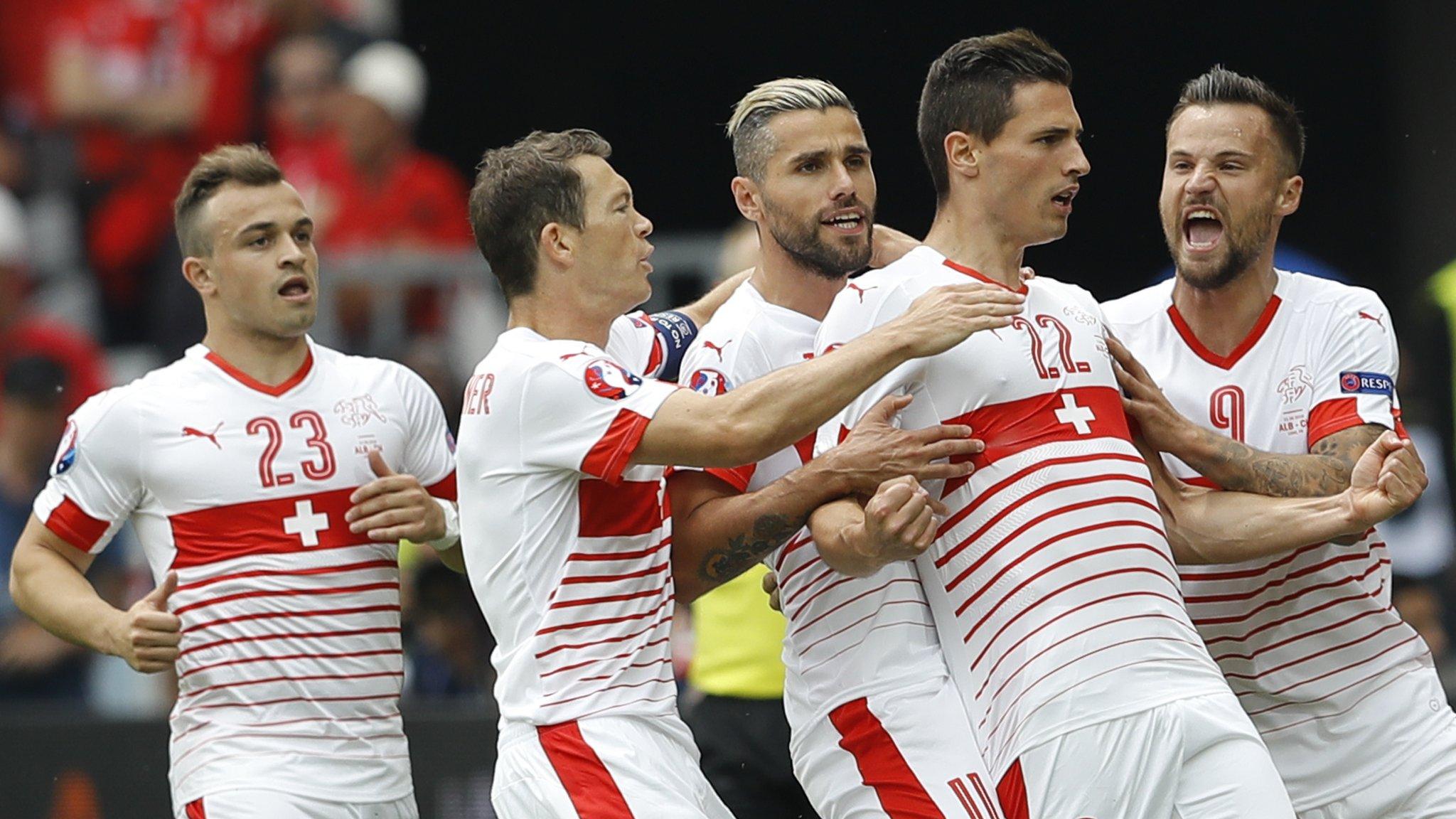 Switzerland celebrates Schar's opening goal