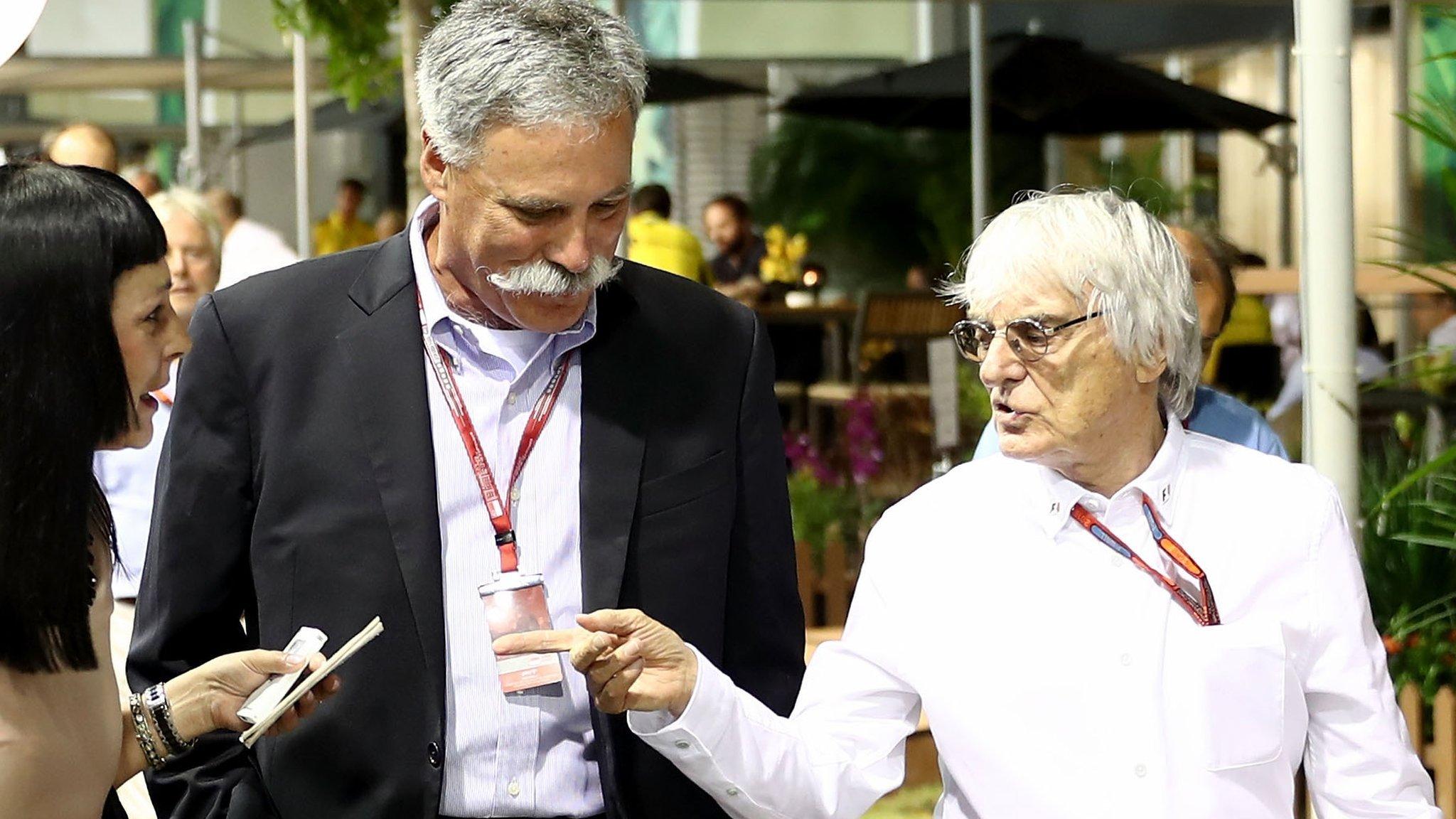 Chase Carey and Bernie Ecclestone