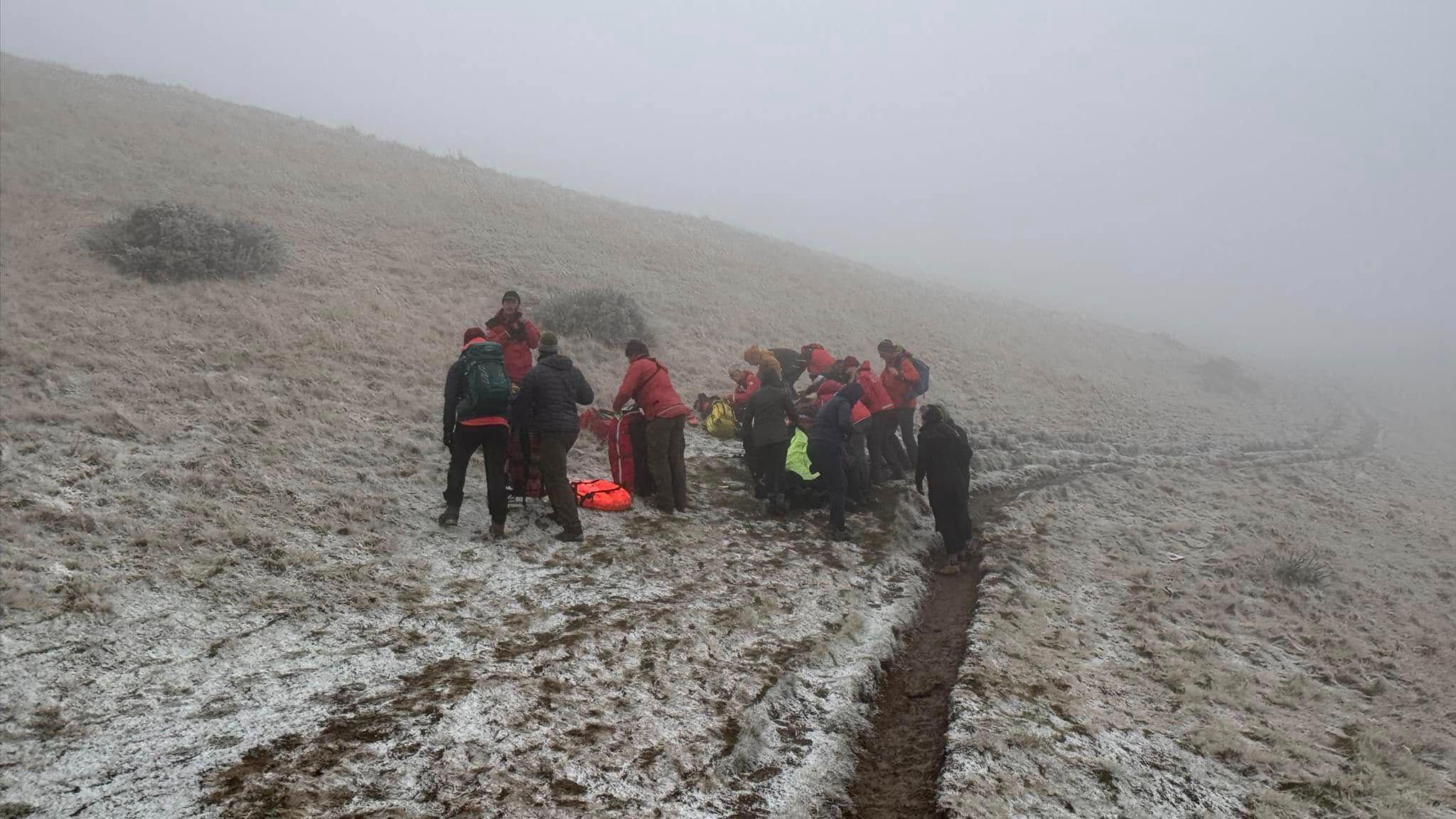 Mountain rescuers deal with injured walker in cold conditions