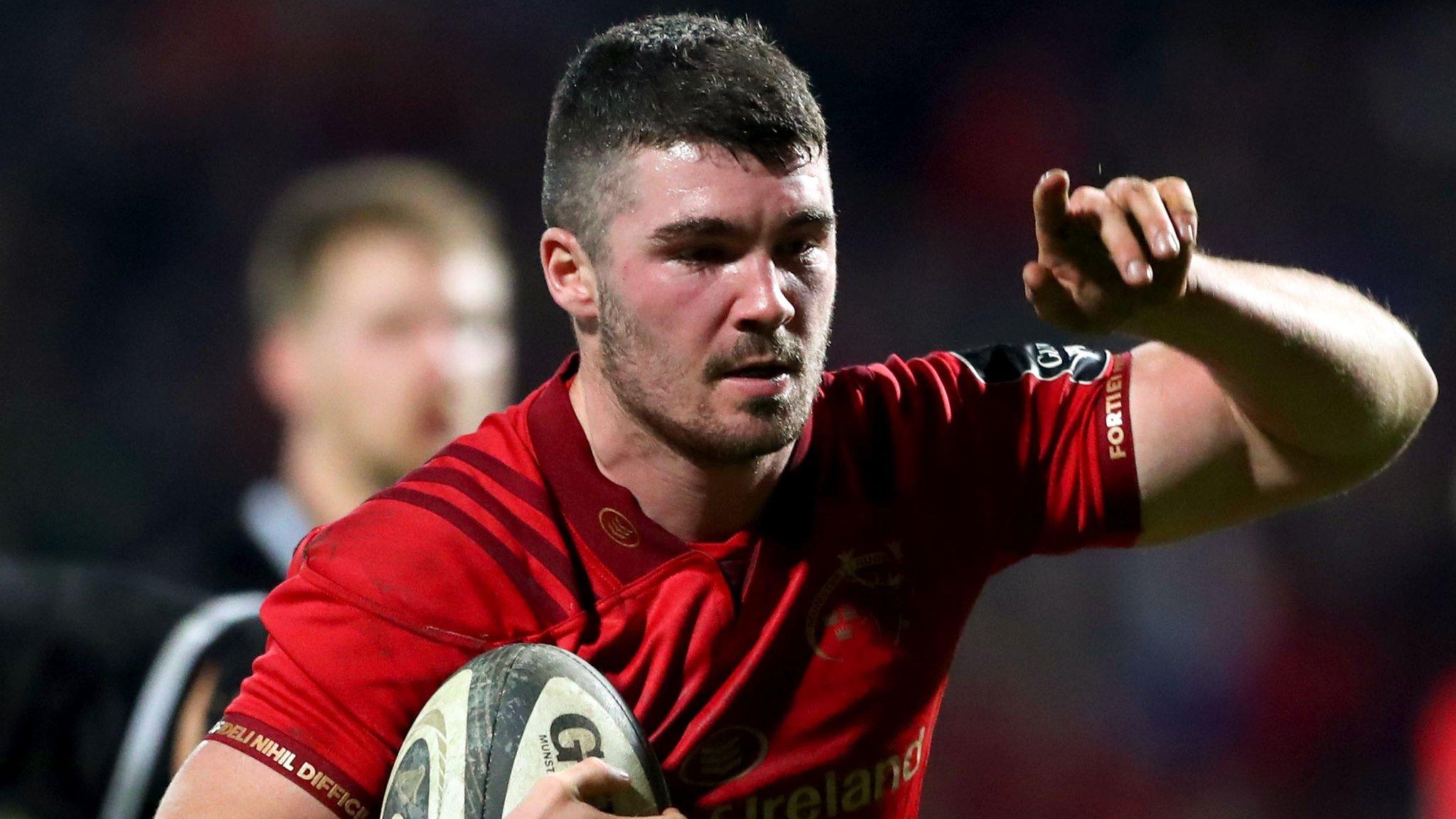 Sam Arnold celebrates as he is about to score Munster's first try