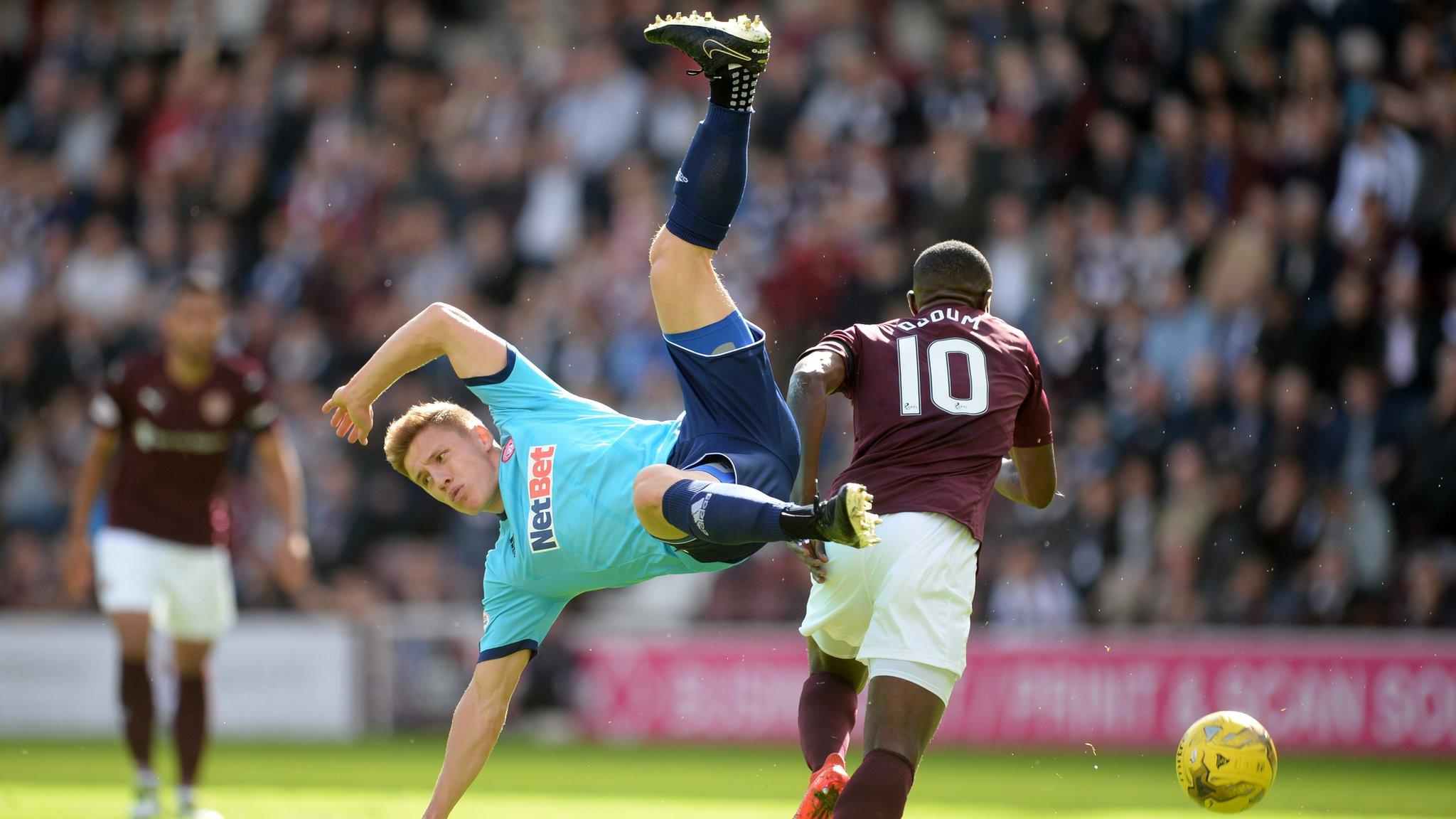 Greg Docherty and Arnaud Djoum