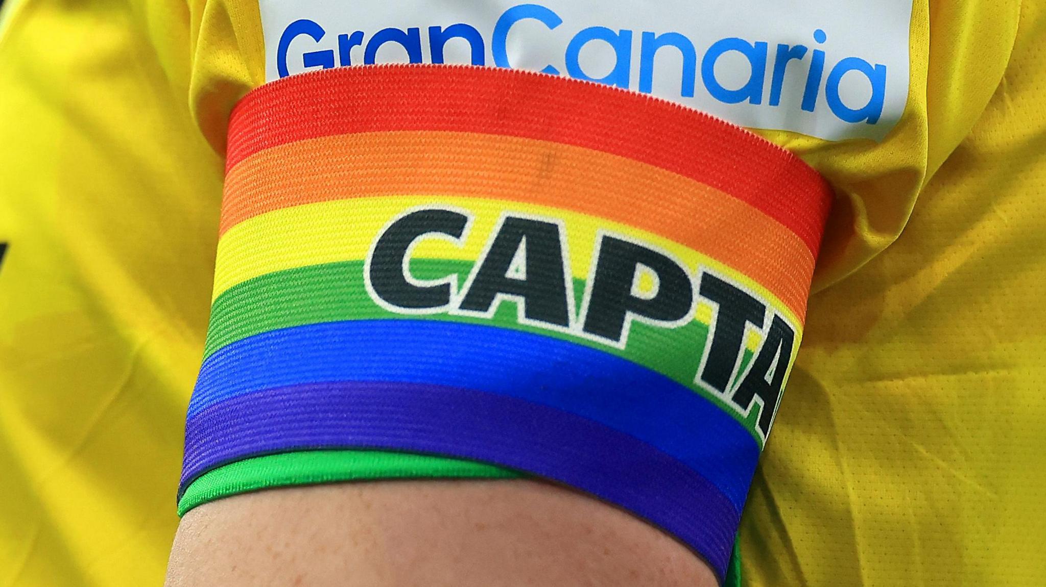 A close-up of Kenny McLean's rainbow captain's armband for Norwich City