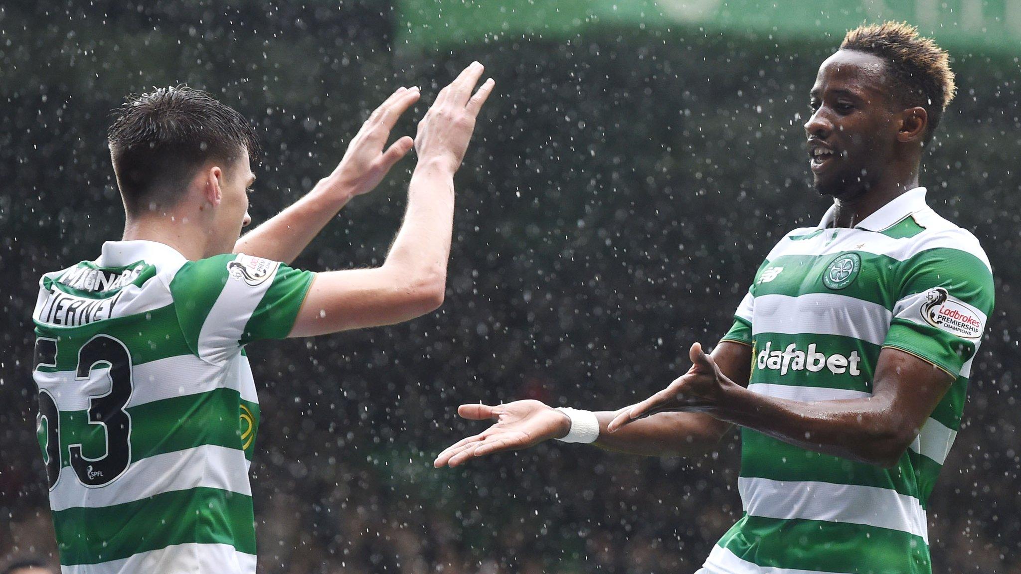 Celtic's Kieran Tierney and Moussa Dembele celebrate