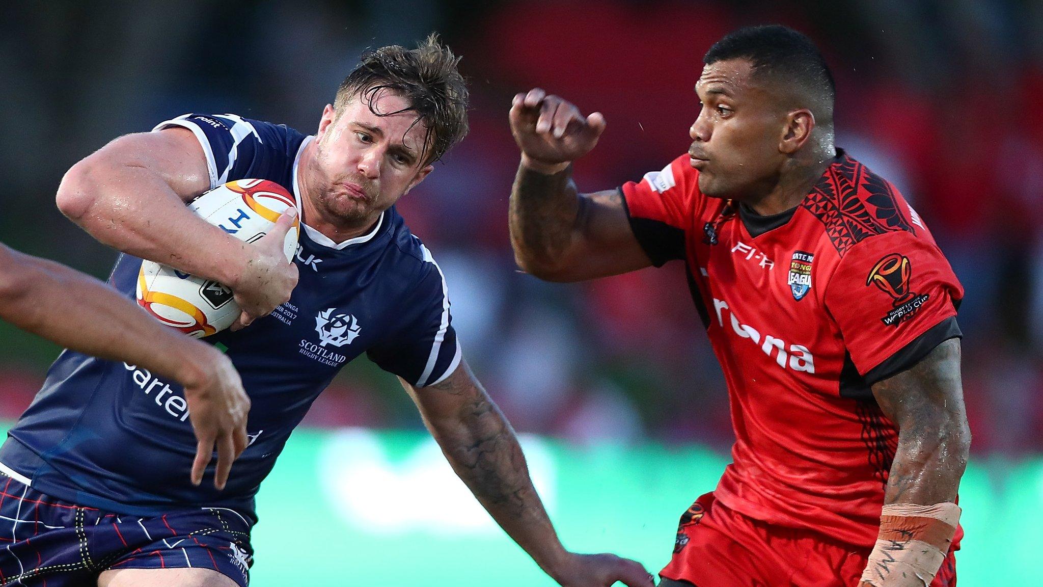 Scotland's Ben Hellewell is tackled during the match against Tonga