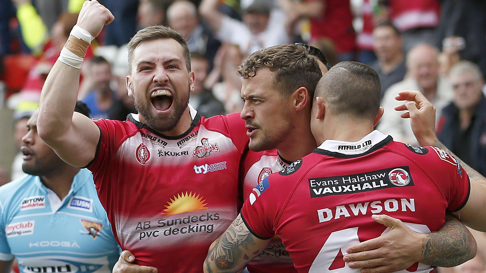 Leigh celebrate Greg Worthington's opening try against Huddersfield