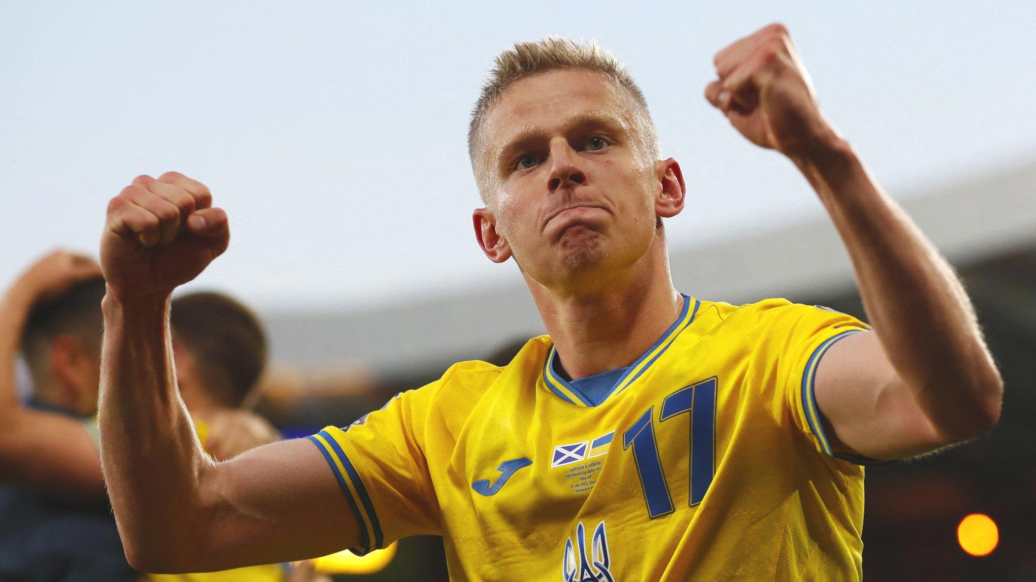 Ukraine's Oleksandr Zinchenko celebrates after the match