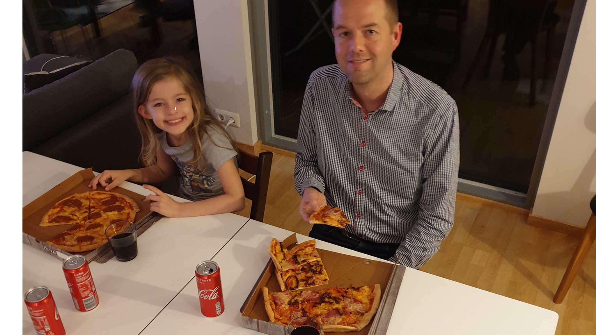 Anders Johansen marking the confirmation of his theory with his daughter Laura with a celebratory pizza