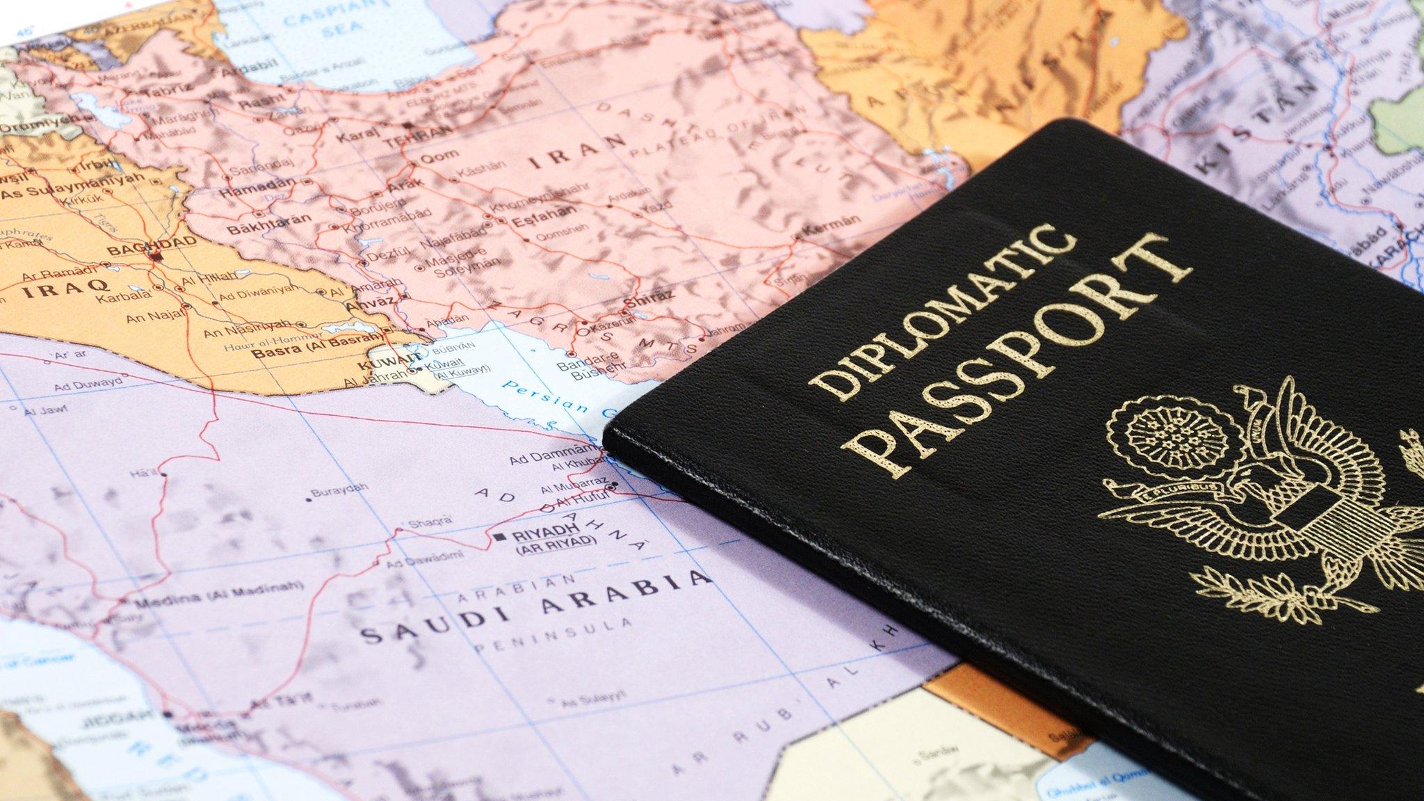 Diplomatic passport on a map