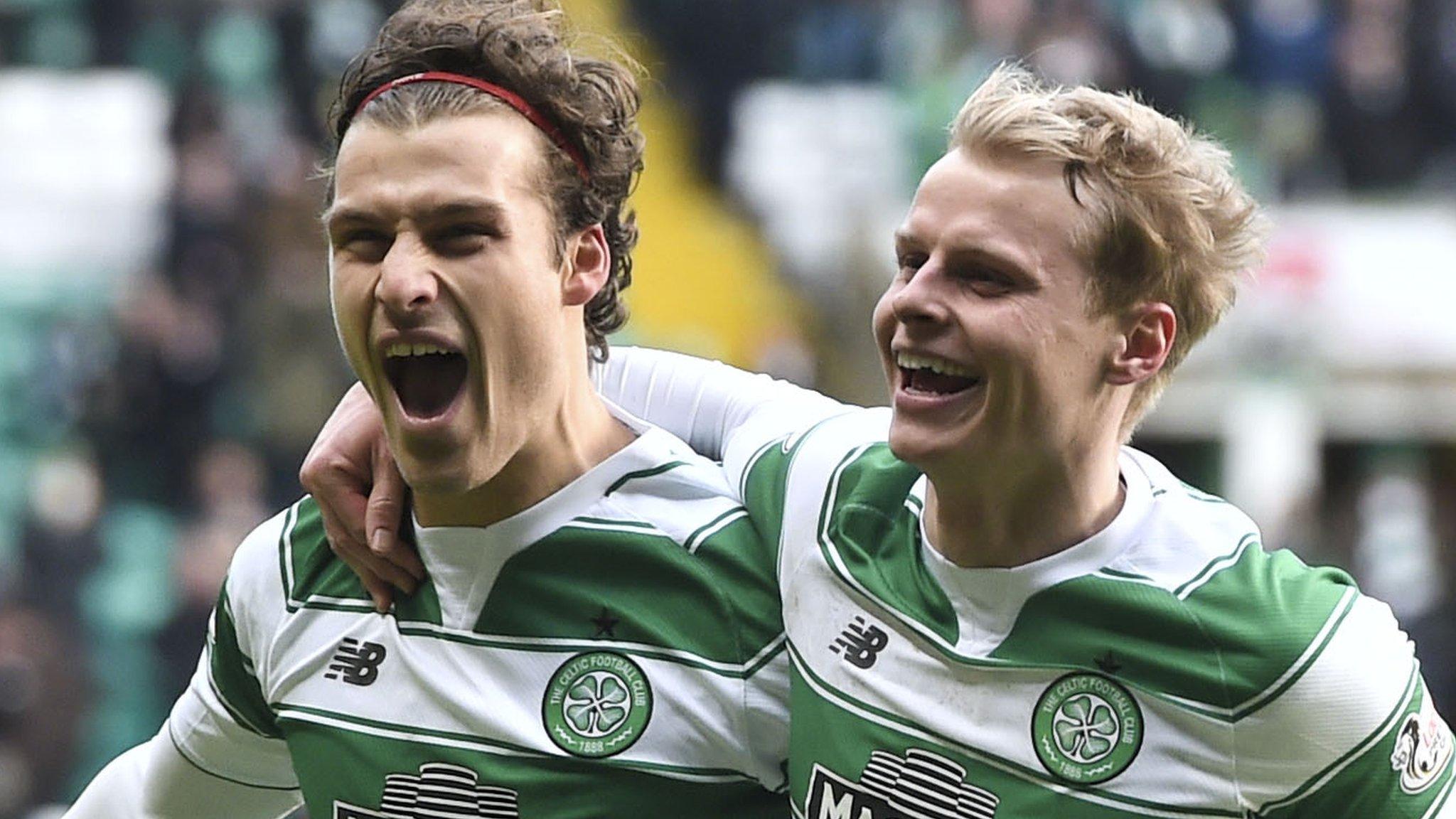 Celtic's Erik Sviatchenko and Gary Mackay-Steven celebrate