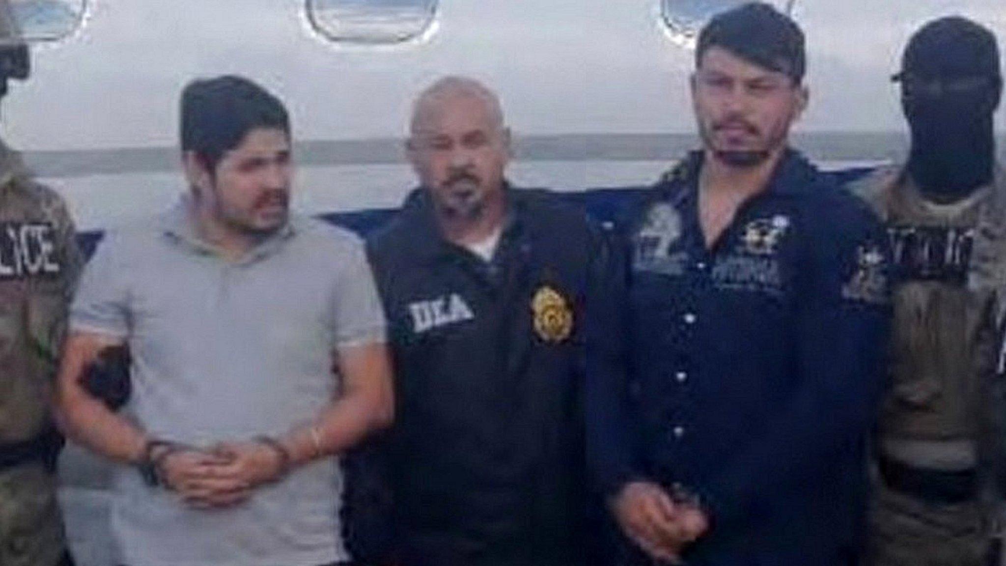 Efrain Antonio Campo Flores (second from left) and Franqui Francisco Flores de Freitas arrested in Haiti on 12 NOvember 2015