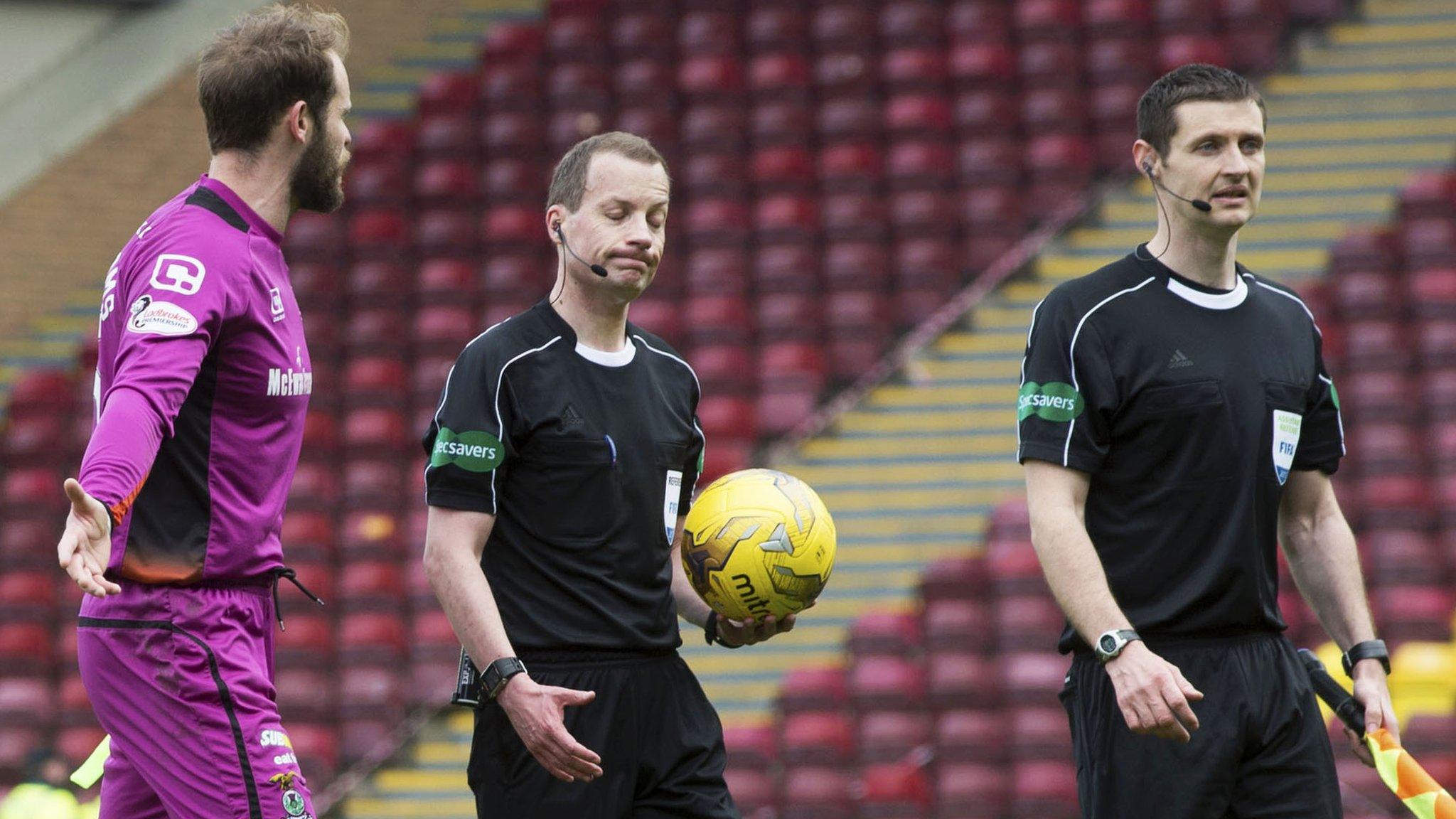 Inverness goalkeeper Owain Fon Williams complains to the referee Willie Collum