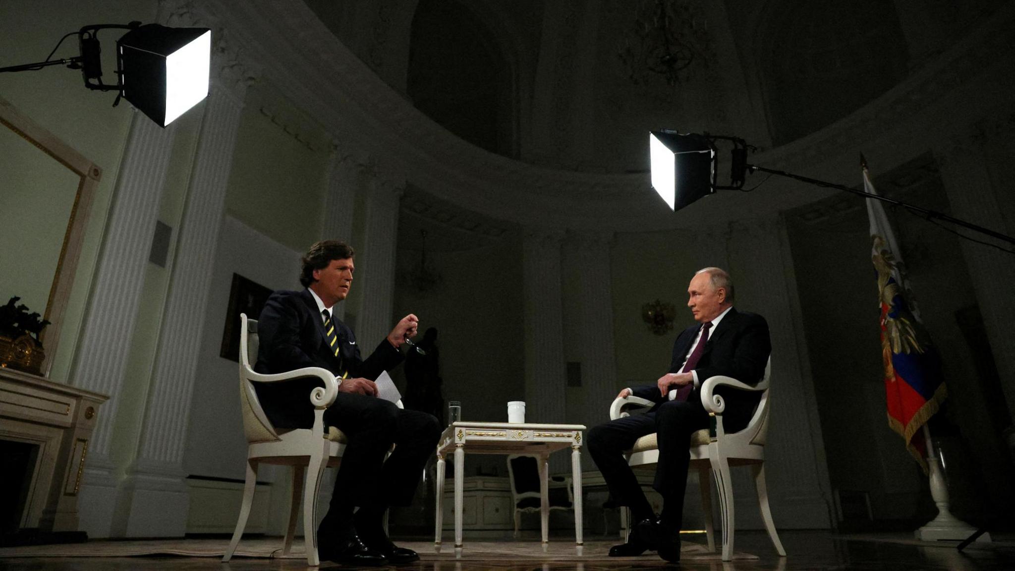 Vladimir Putin and Tucker Carlson