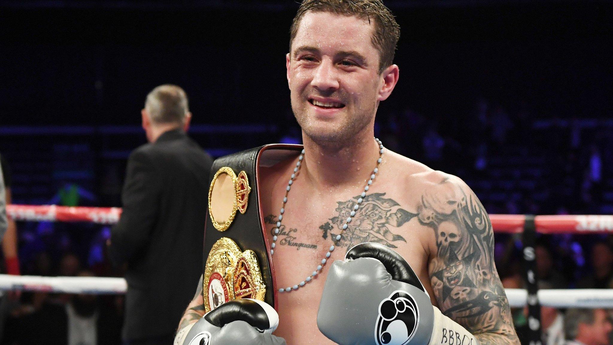 Ricky Burns shows off the WBA world super-lightweight belt after defeating Kiryl Relikh