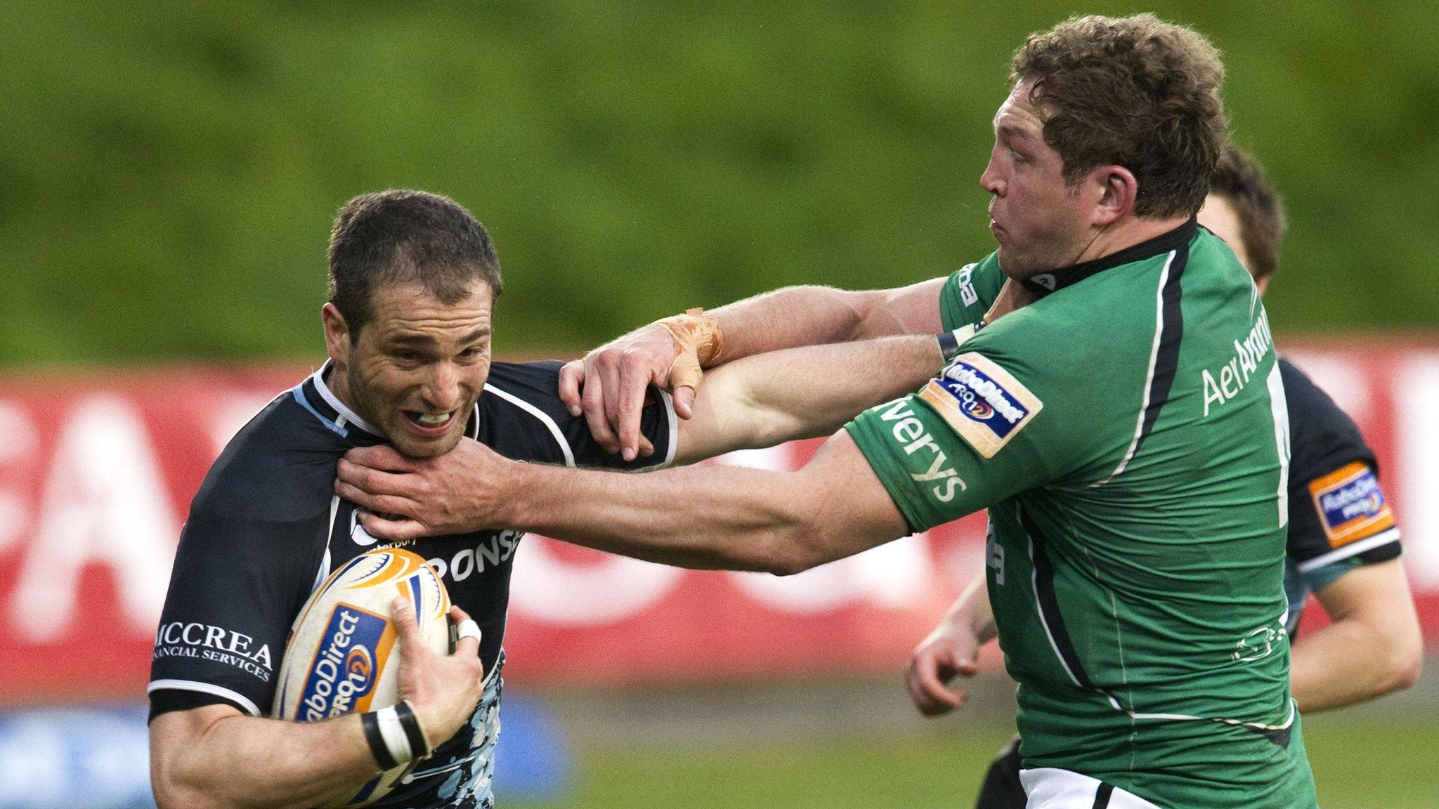 Connacht's Michael Swift makes a high tackle on Glasgow's Federico Aramburu