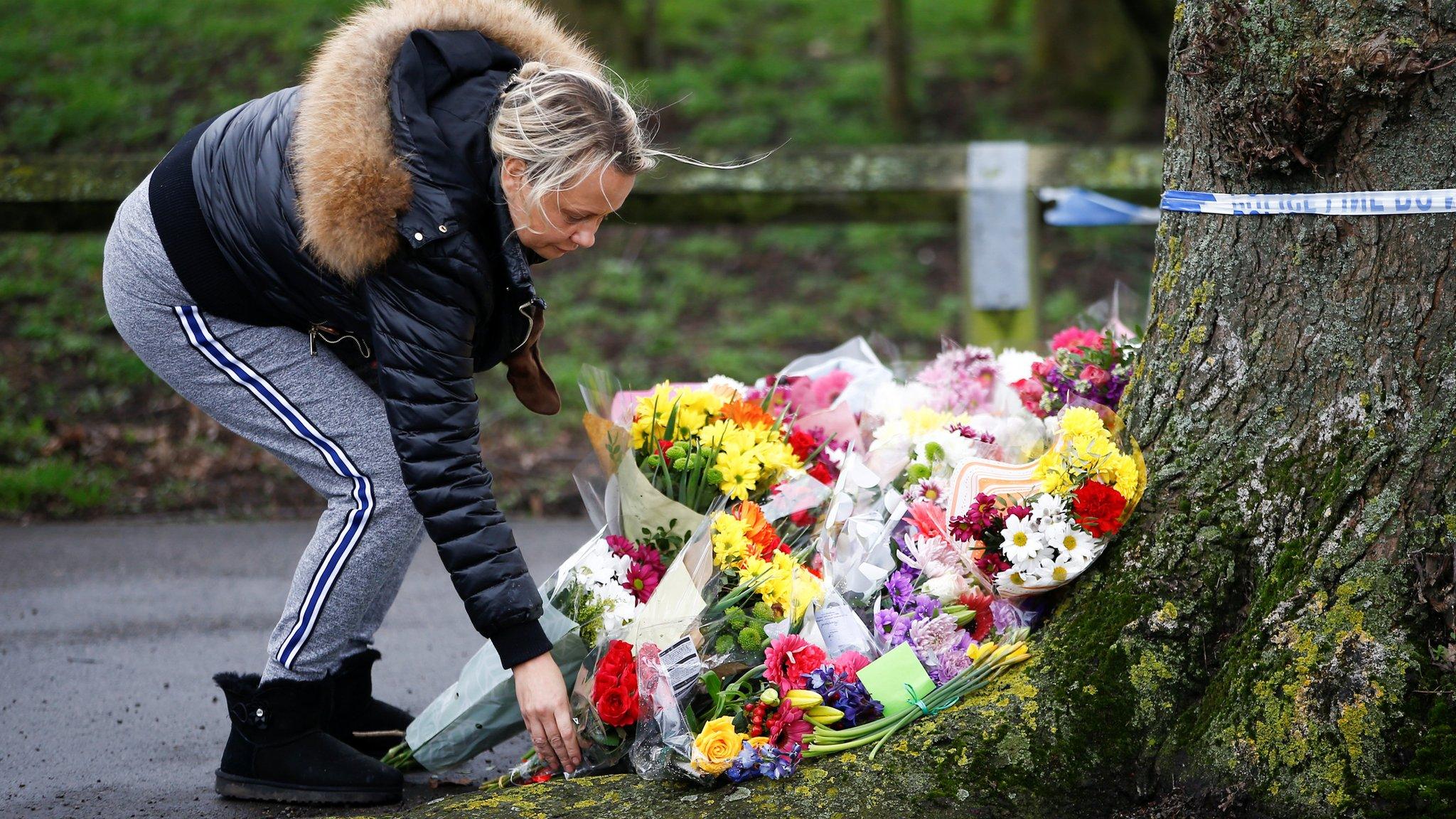 People lay floral tributes near to where 17-year-old Jodie Chesney was killed.