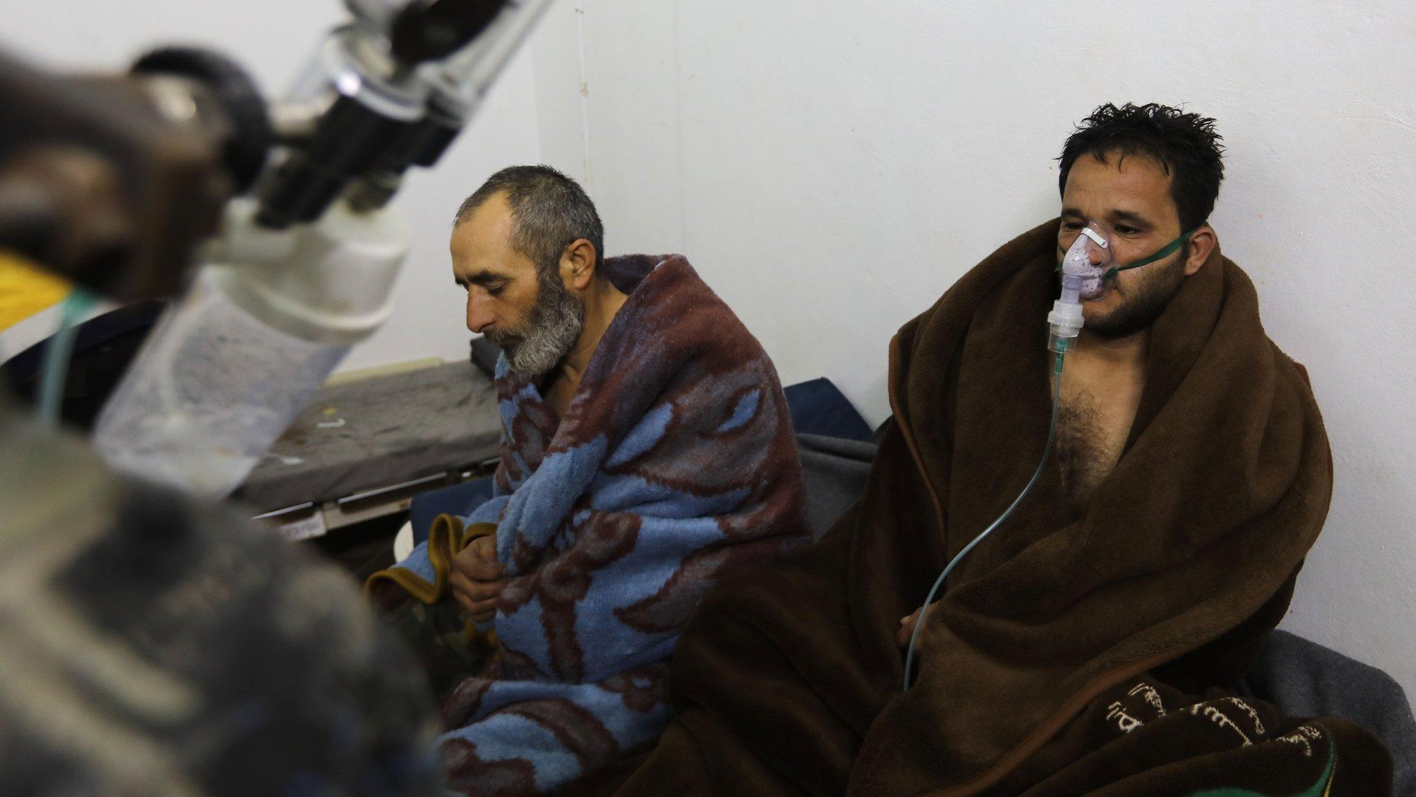 Syrians reportedly suffering from breathing difficulties following a Syrian government air strikes on the town of Saraqeb rest at a field hospital (4 February 2018)