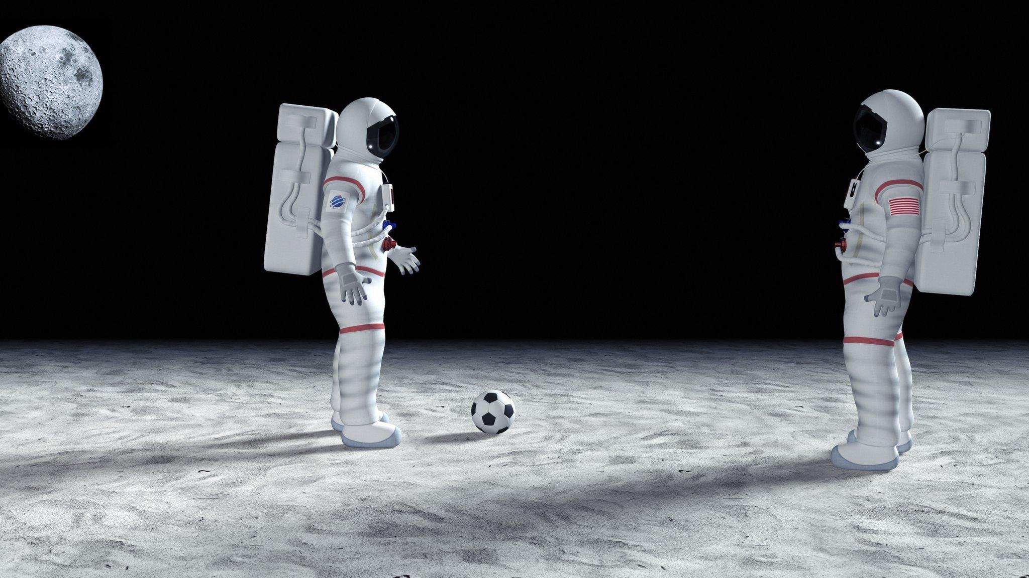 astronauts-kicking-a-ball