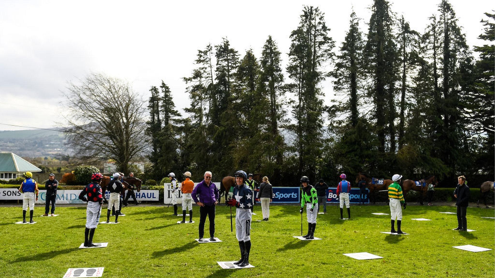 Jockeys observing social distancing